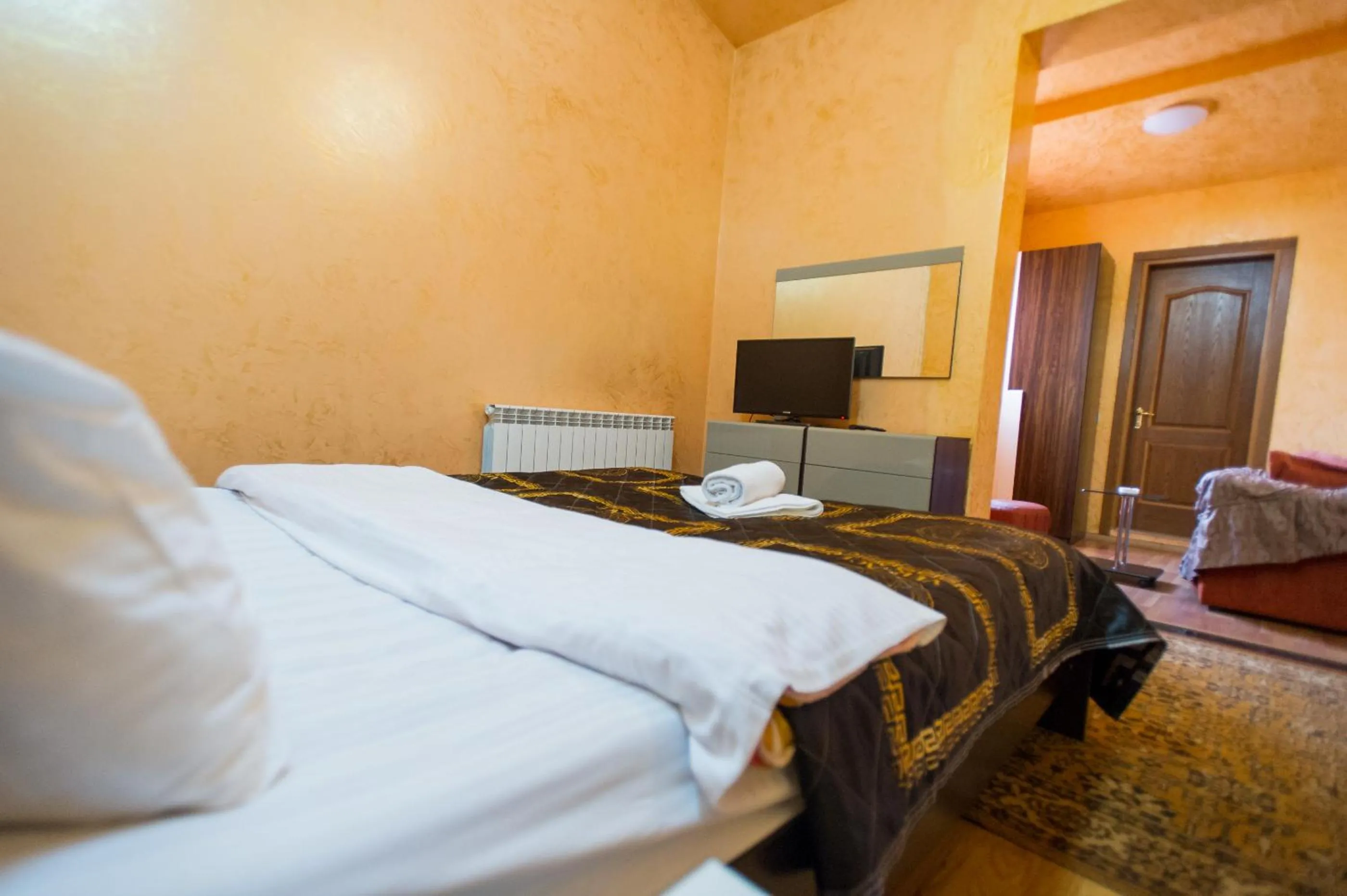 Photo of the whole room, Bed in hotel amber