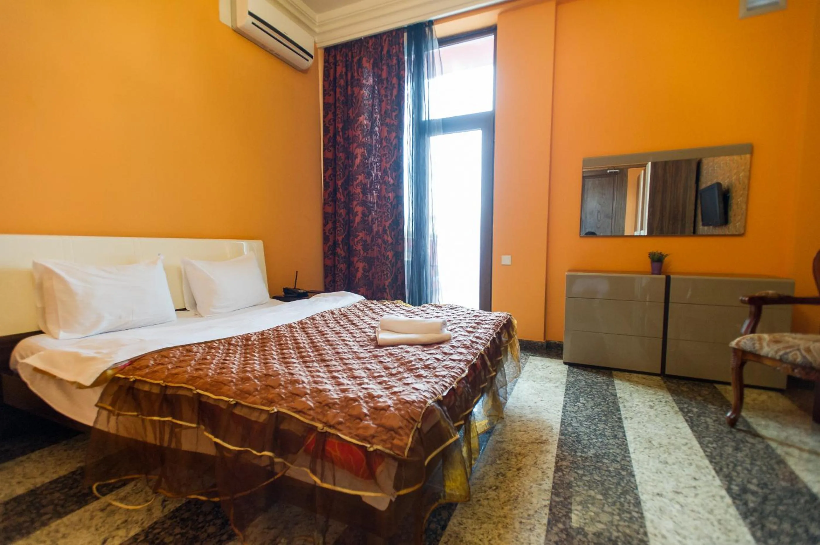 Photo of the whole room, Bed in hotel amber