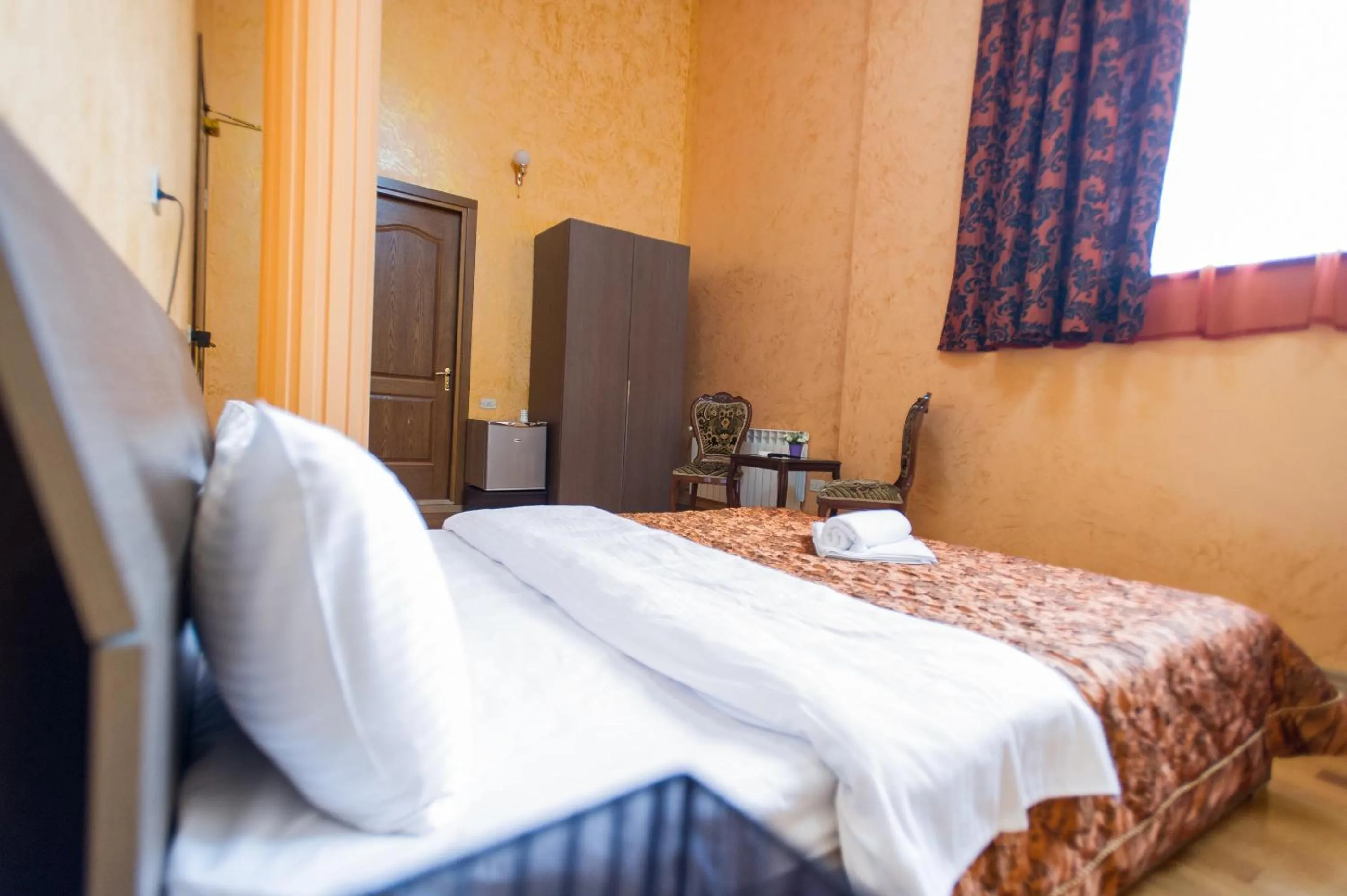 Photo of the whole room, Bed in hotel amber
