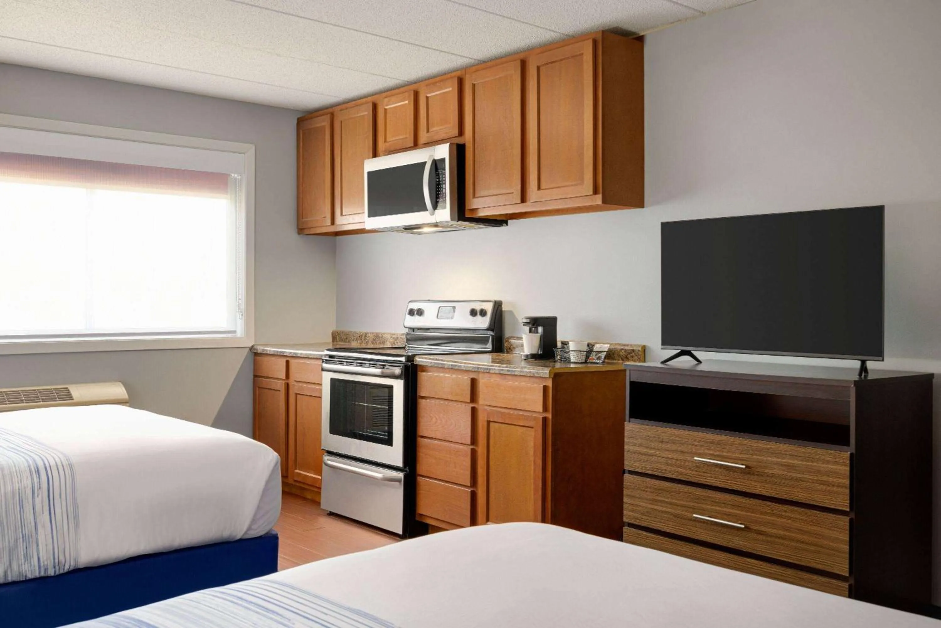 Photo of the whole room, Bed in AmericInn by Wyndham Inver Grove Heights Minneapolis