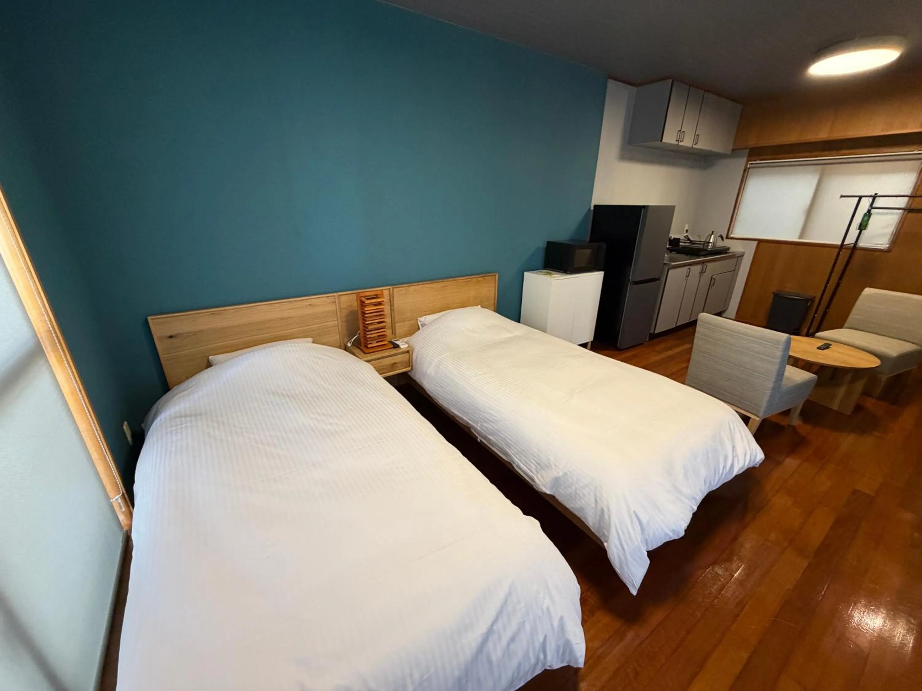 Bed in Kokusai Towns Inn