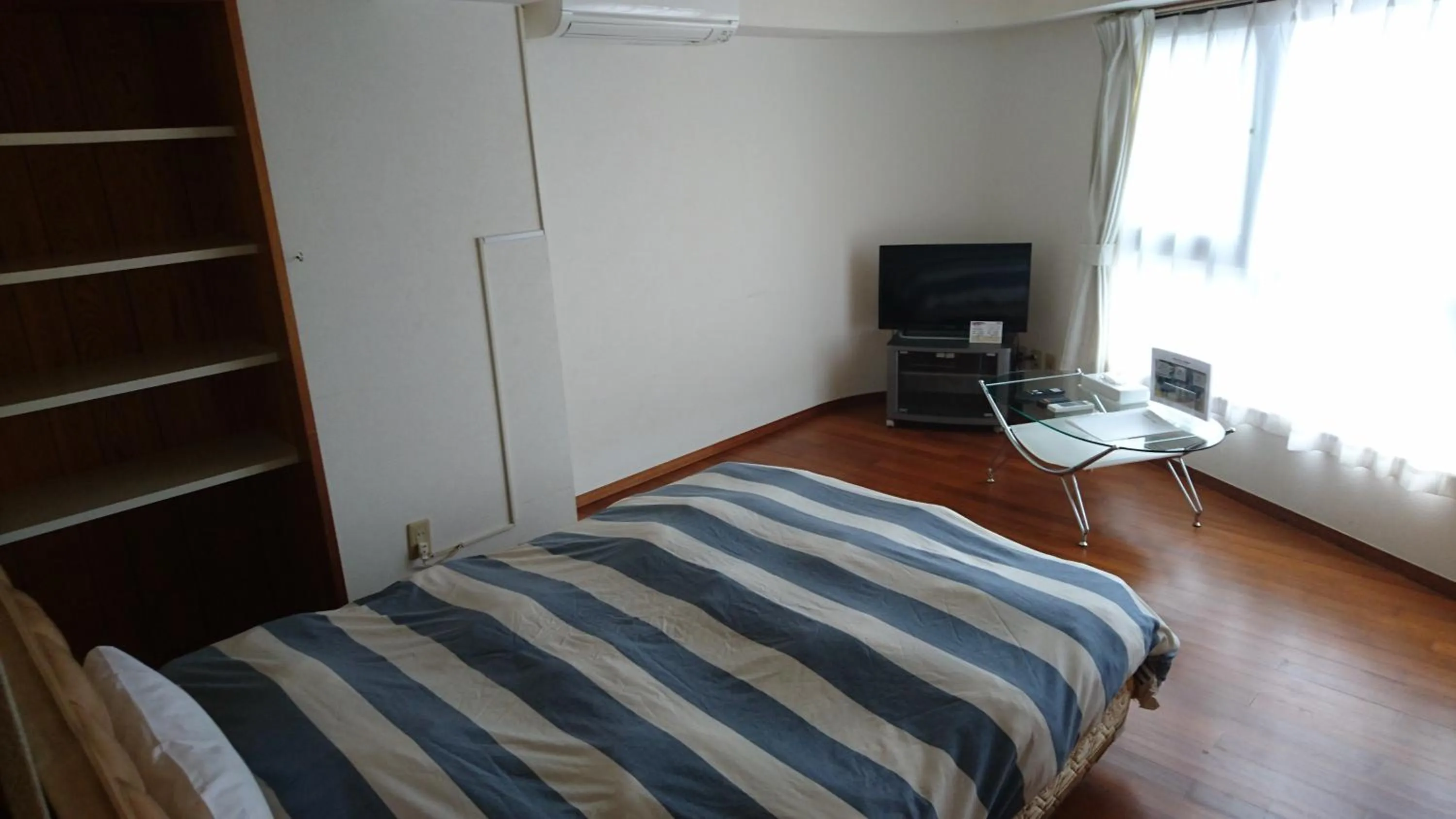 Bed in Kokusai Towns Inn