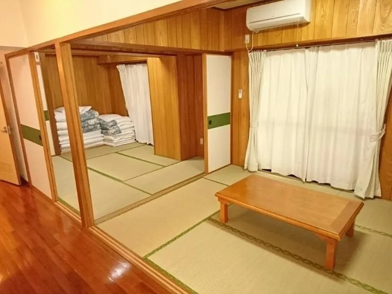 Bed in Kokusai Towns Inn