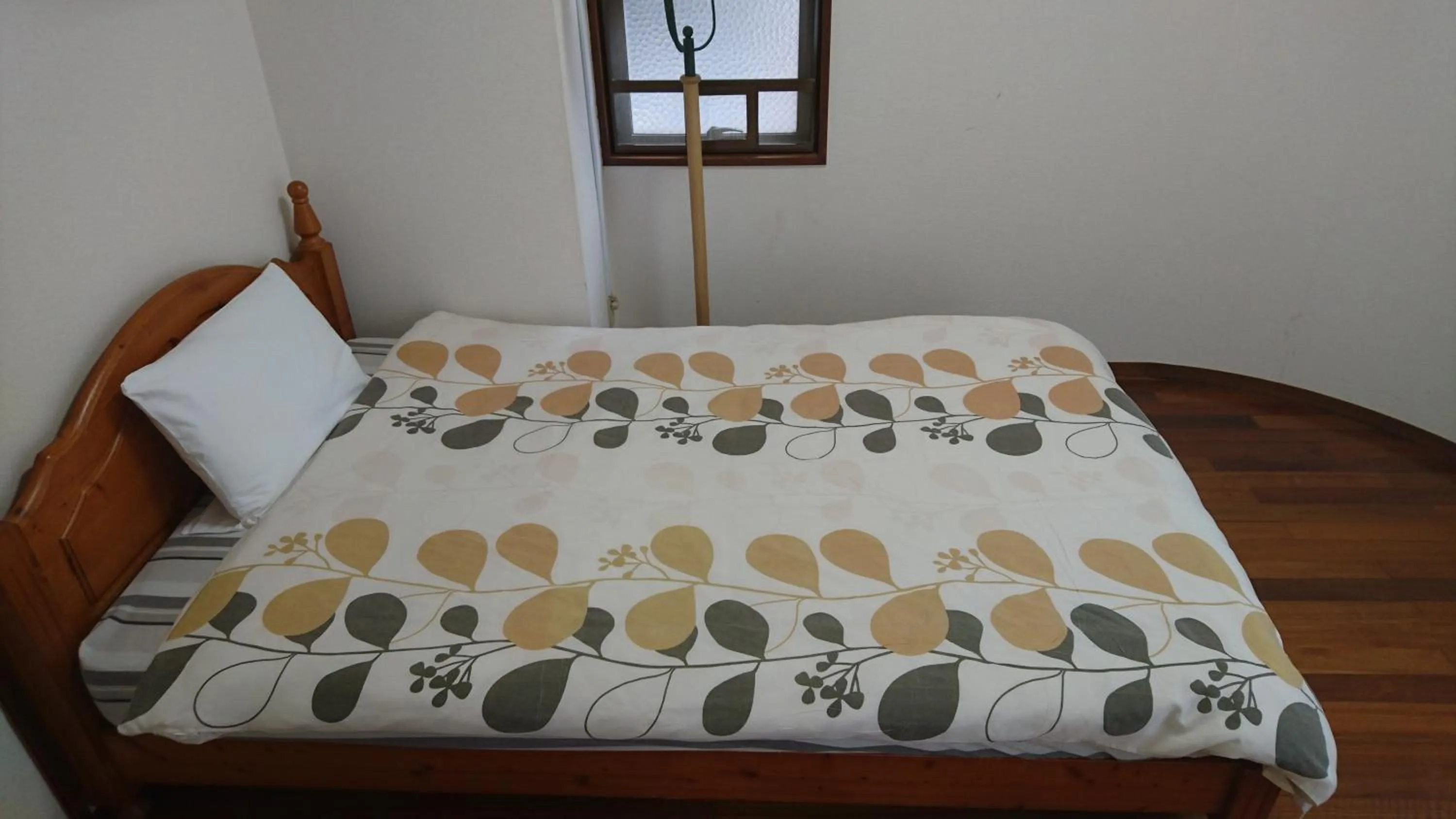 Bed in Kokusai Towns Inn