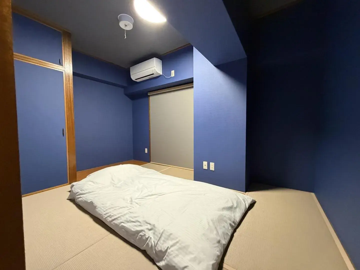 Bed in Kokusai Towns Inn Bed in Kokusai Towns Inn