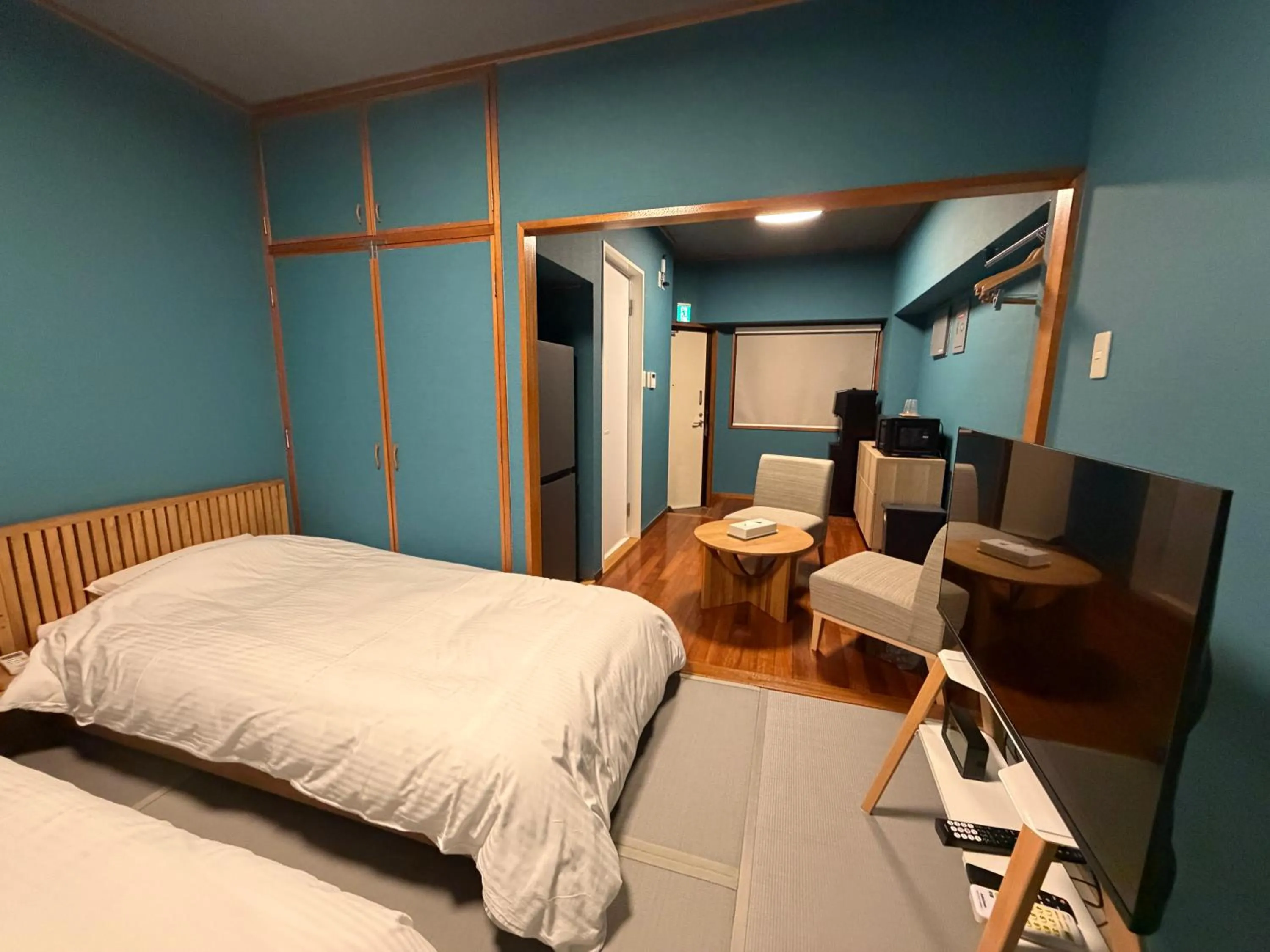 Bed in Kokusai Towns Inn