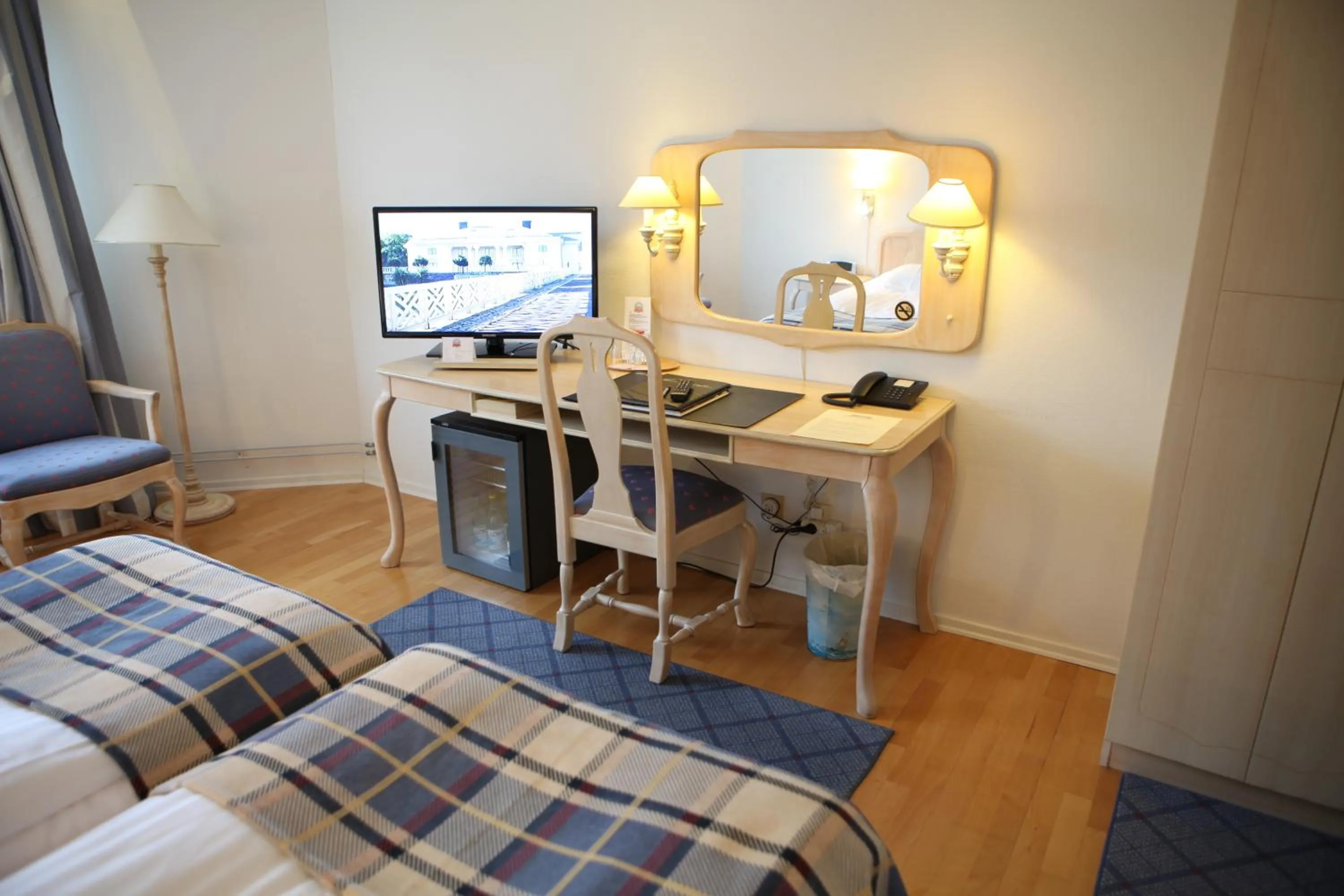 Seating area, Bed in Hotel Mölndals Bro