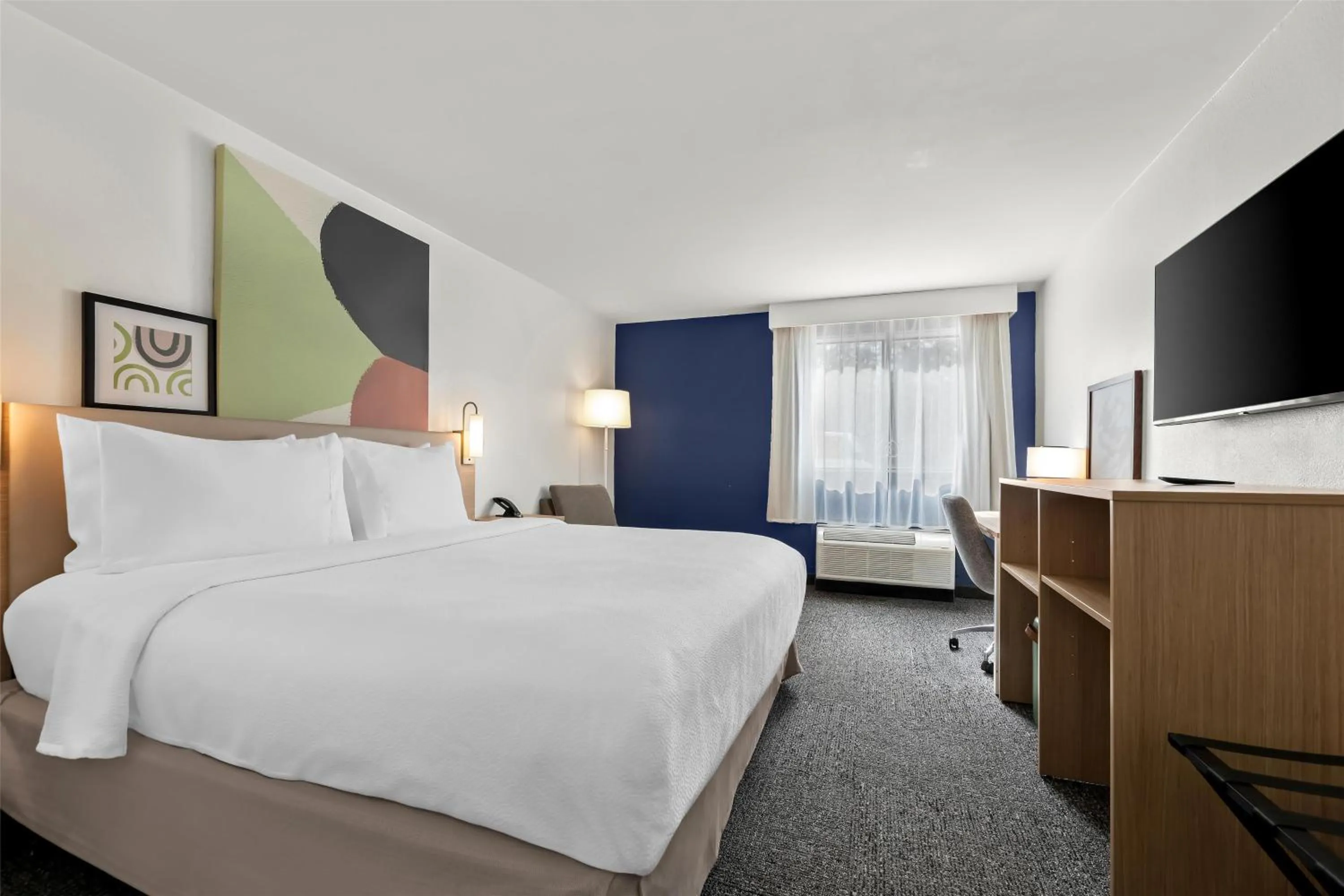 Bed in Spark By Hilton Biloxi Ocean Springs