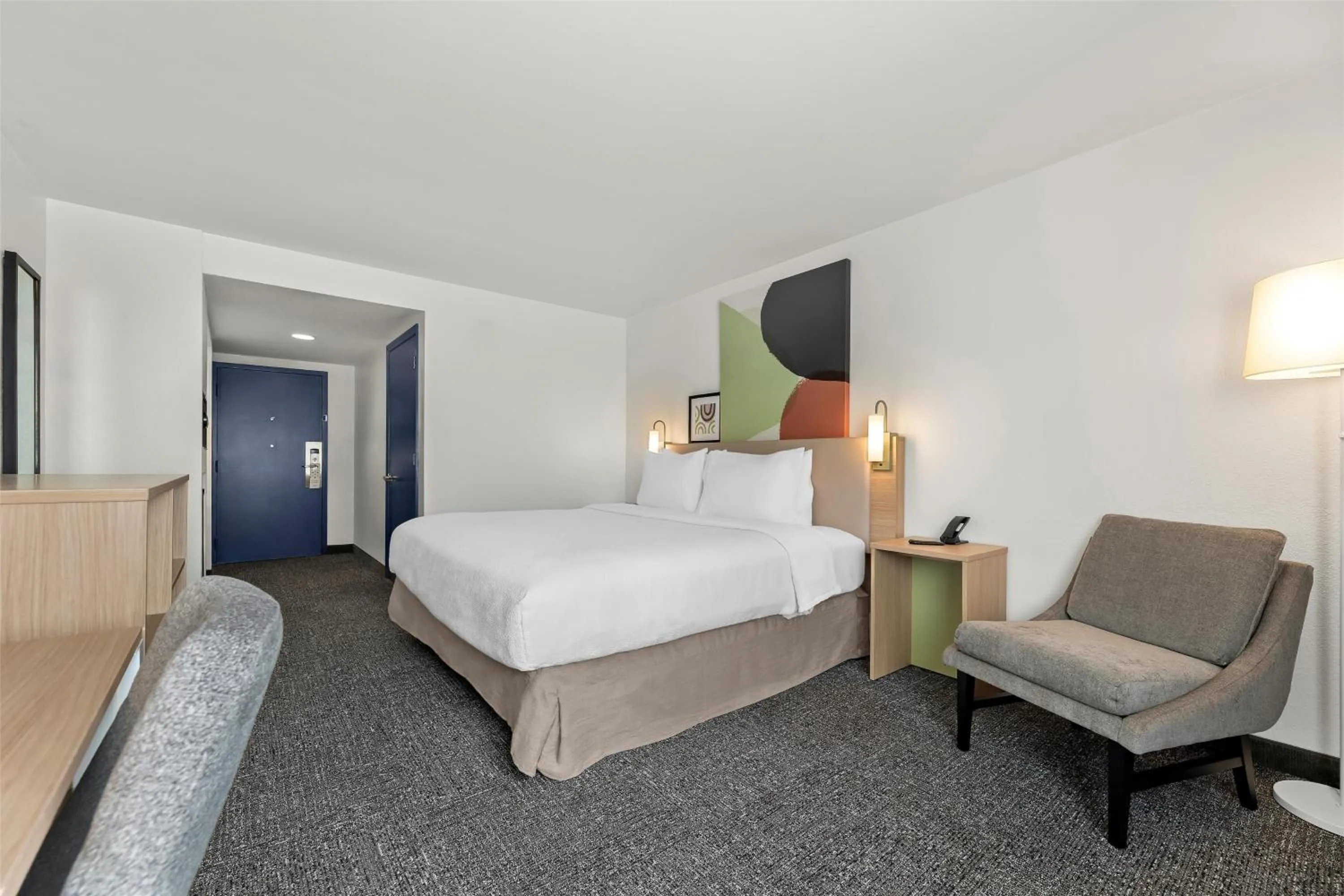 Bed in Spark By Hilton Biloxi Ocean Springs