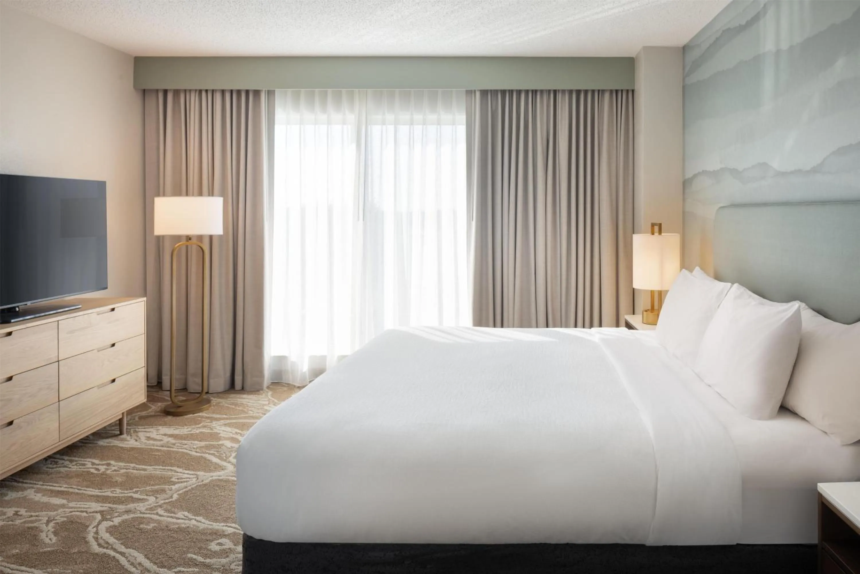 Bed in Embassy Suites San Marcos Hotel Conference Center