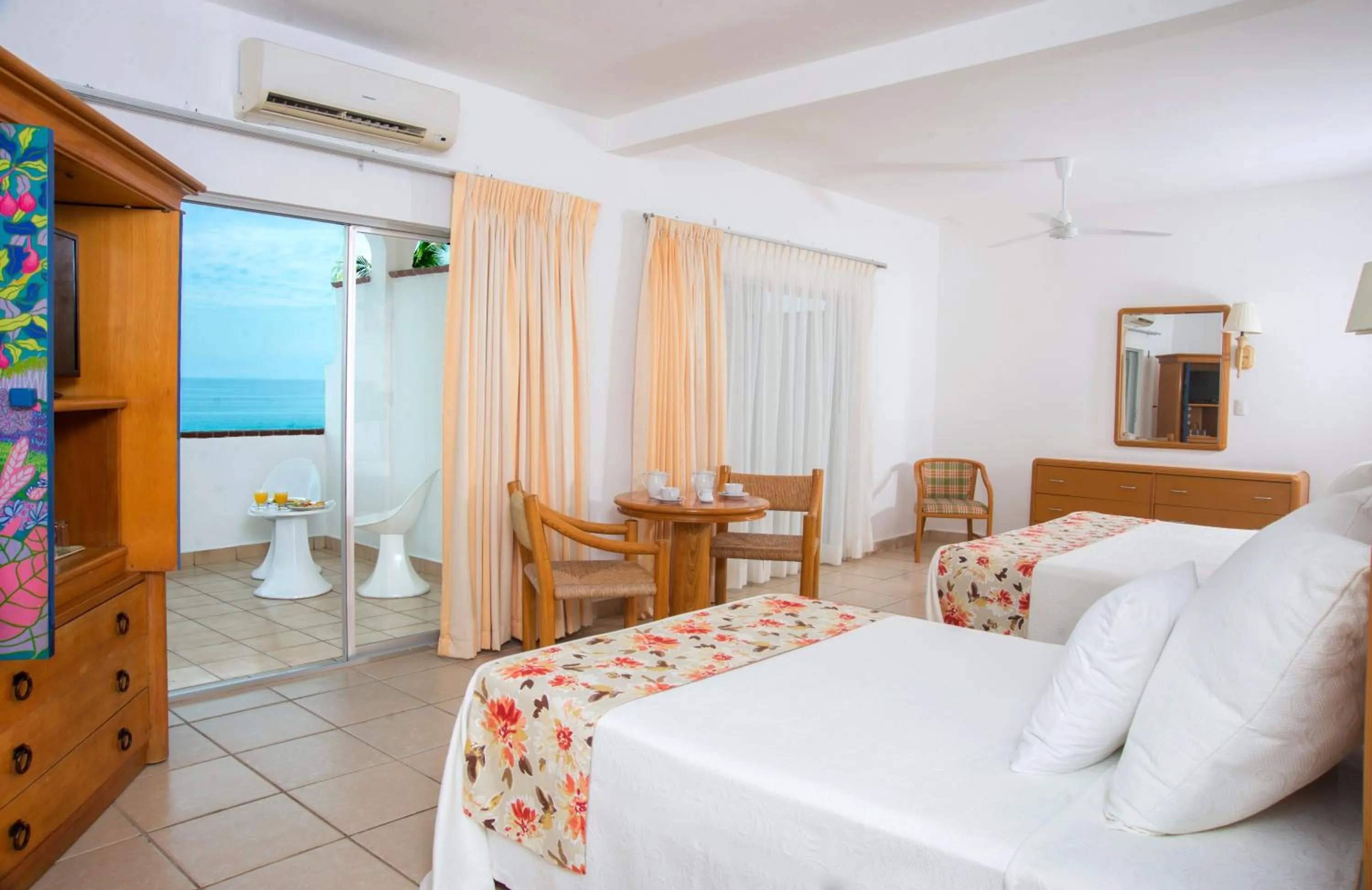 Photo of the whole room, Bed in Tropicana Hotel Puerto Vallarta