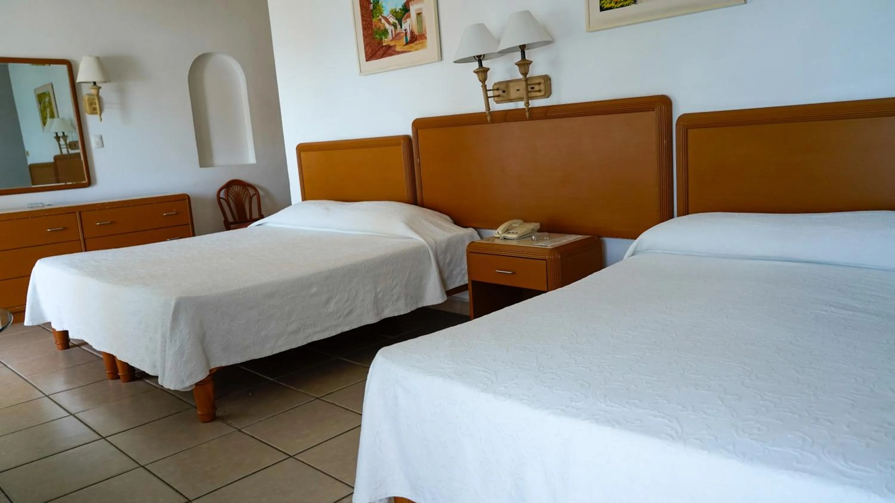 Bed in Tropicana Hotel Puerto Vallarta