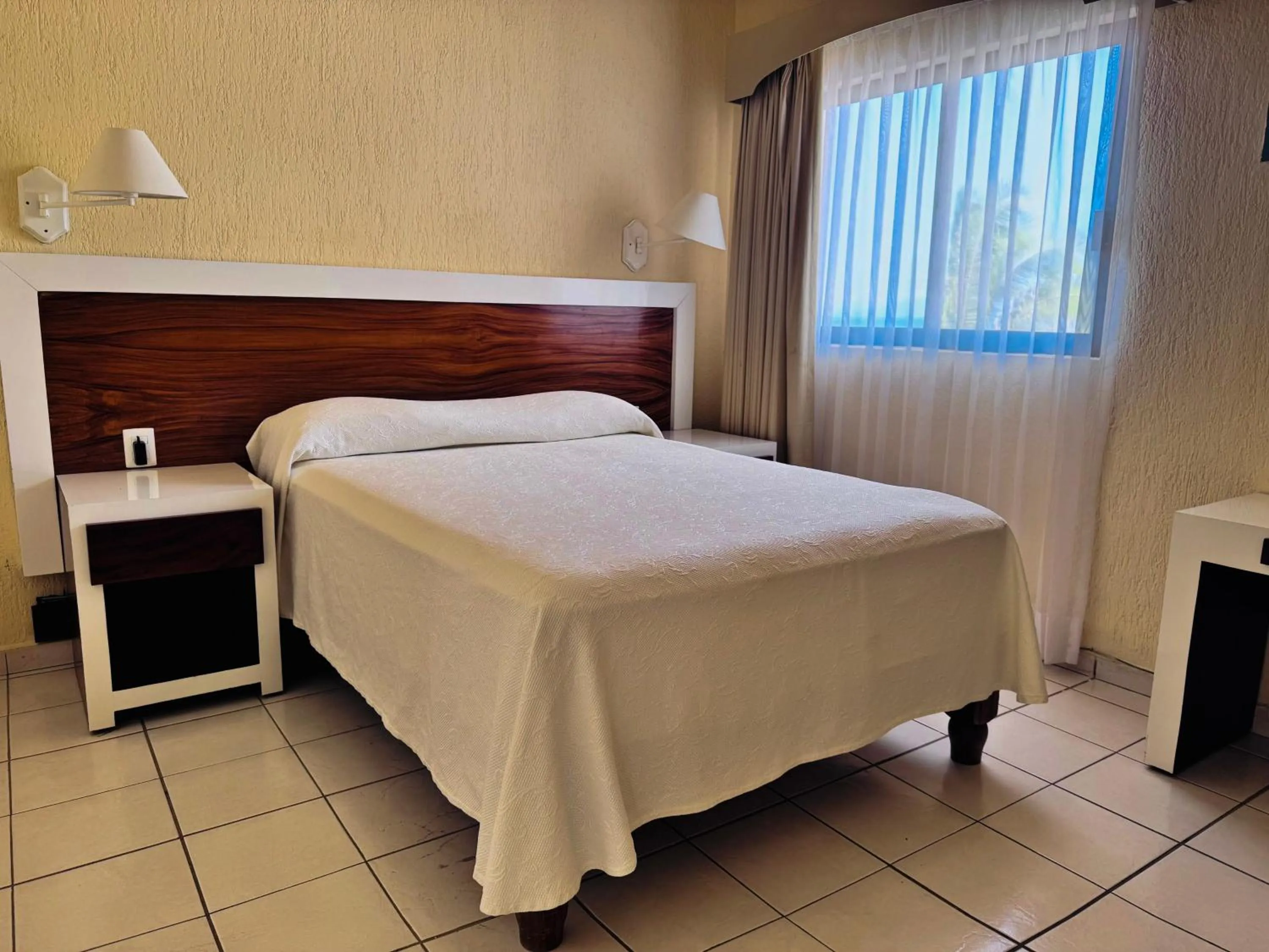 Bed in Tropicana Hotel Puerto Vallarta