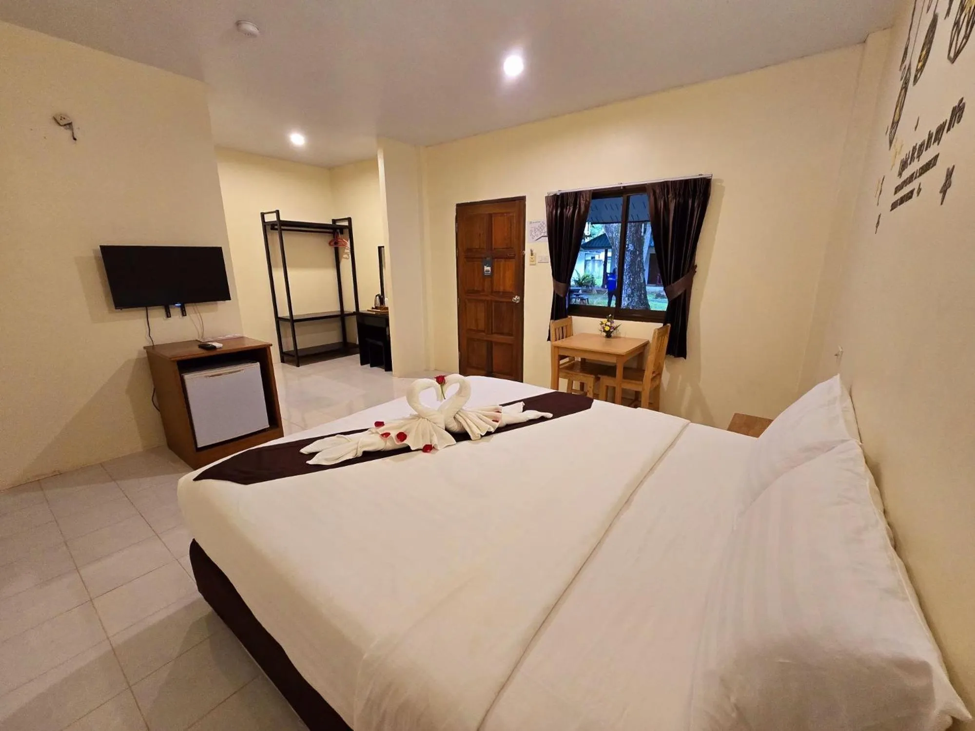 Bed in Mild Garden View Resort