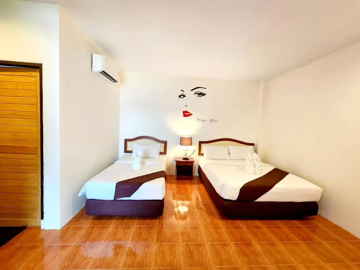 Bed in Mild Garden View Resort Bed in Mild Garden View Resort