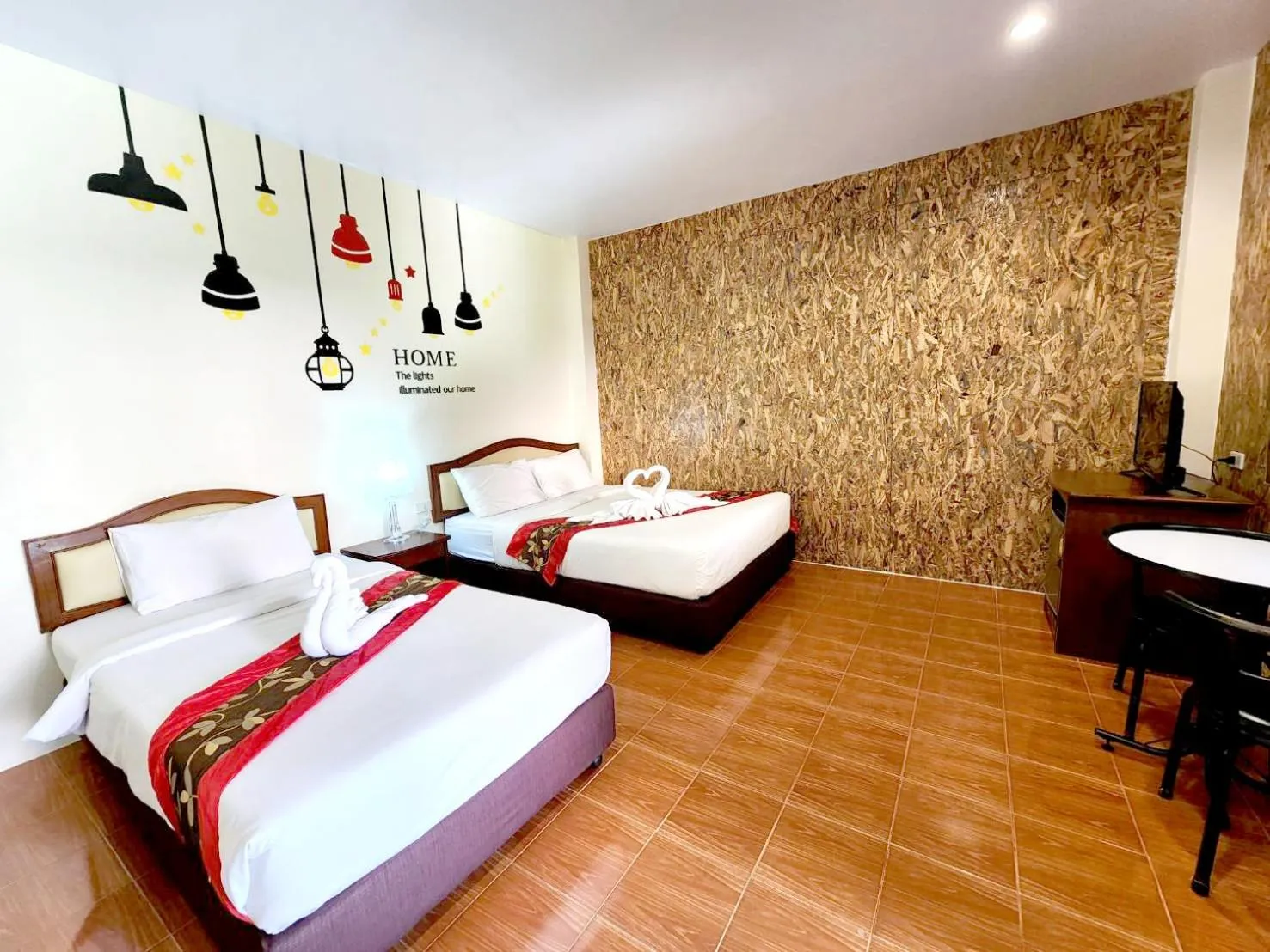 Bed in Mild Garden View Resort