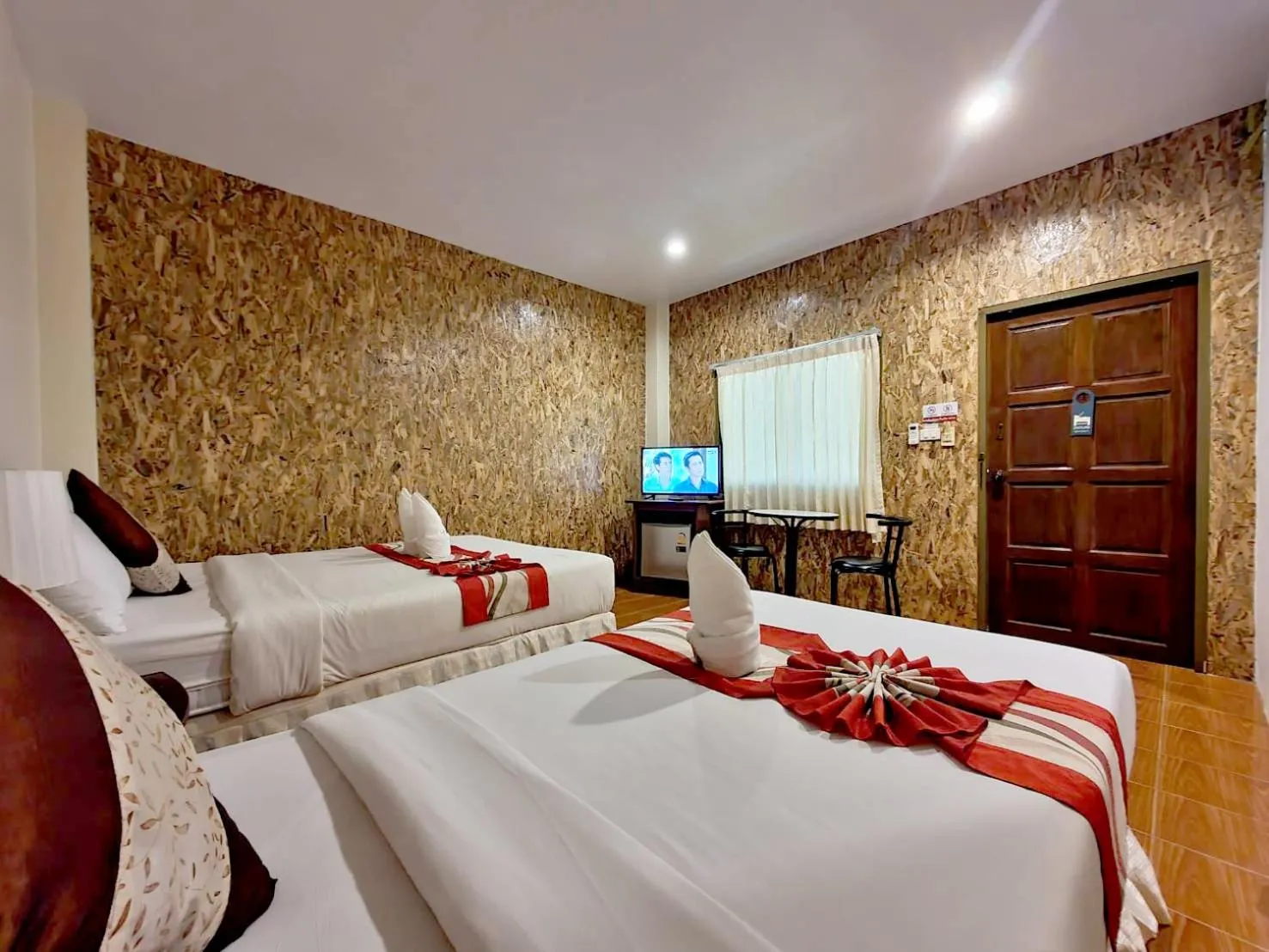 Bed in Mild Garden View Resort