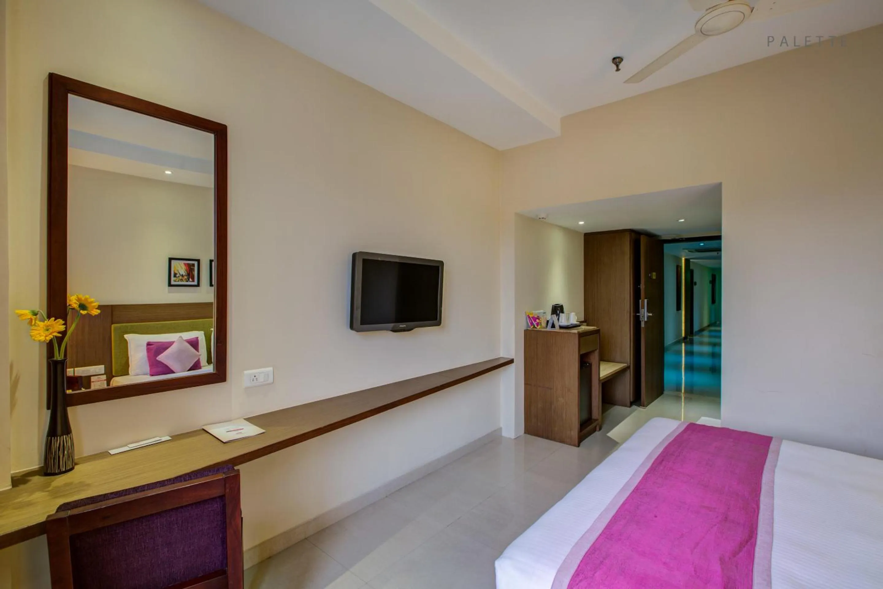 Photo of the whole room, Bed in JK Residency Kelakam