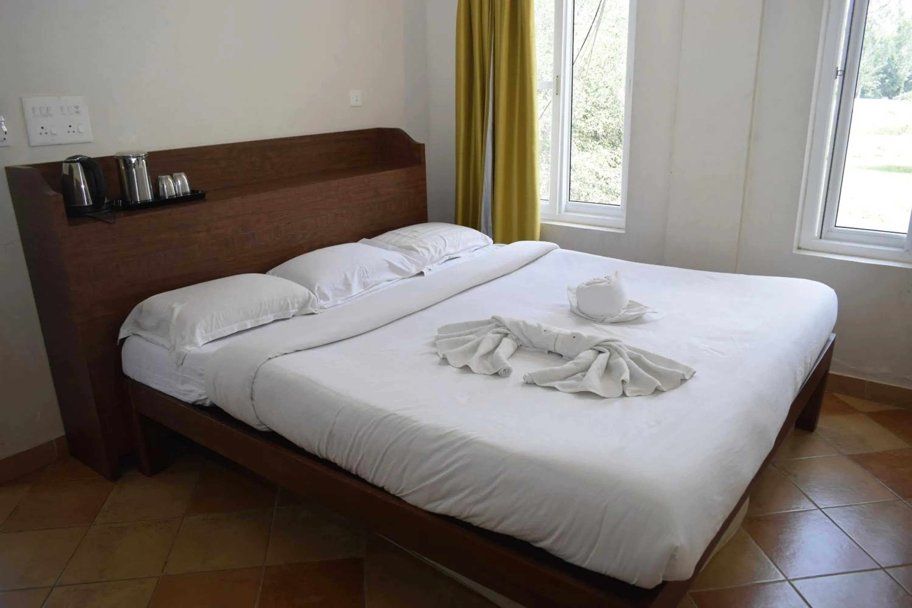 Bed in River Valley Resort