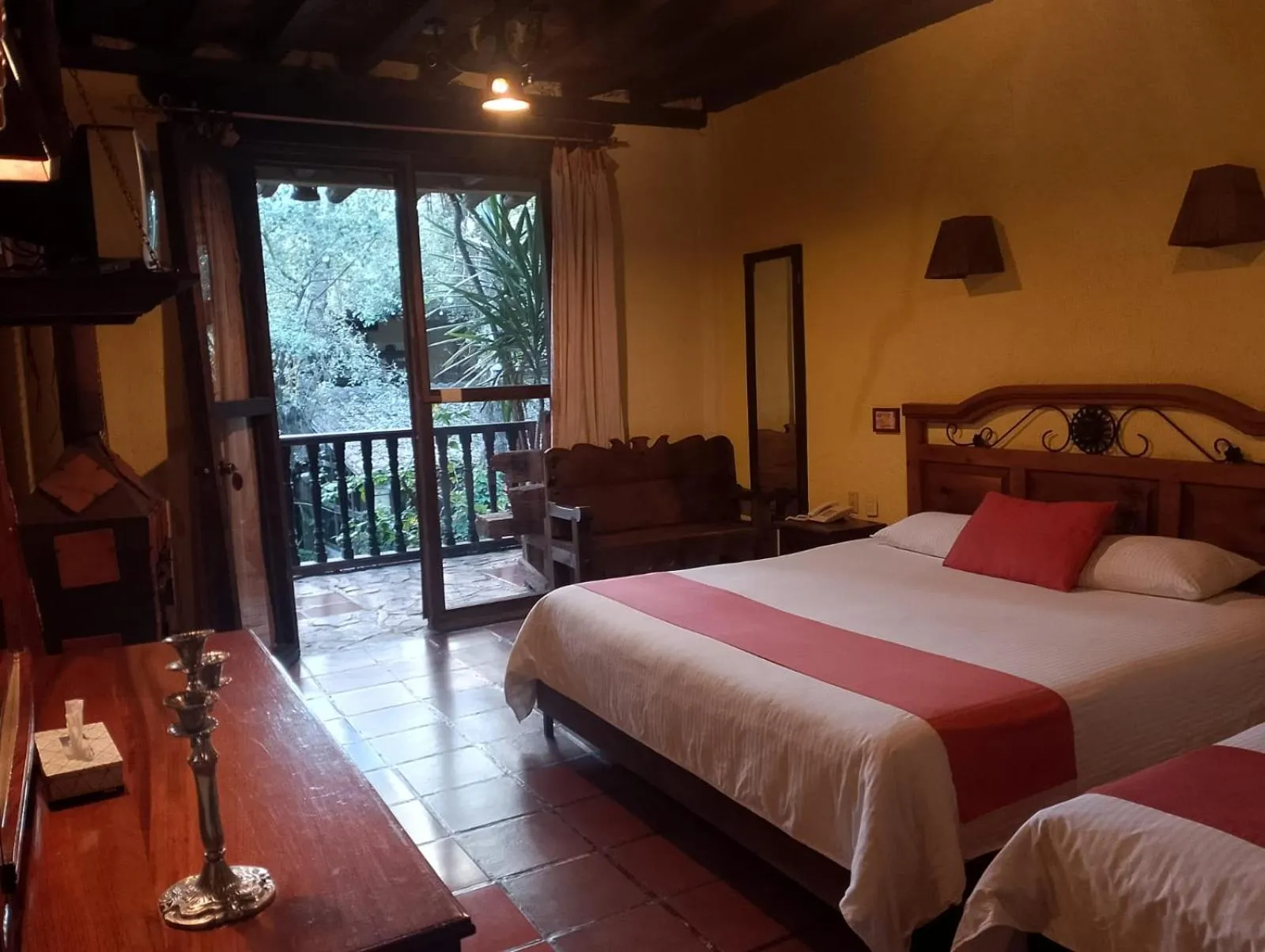 Bed in Hotel Hacienda Don Juan
