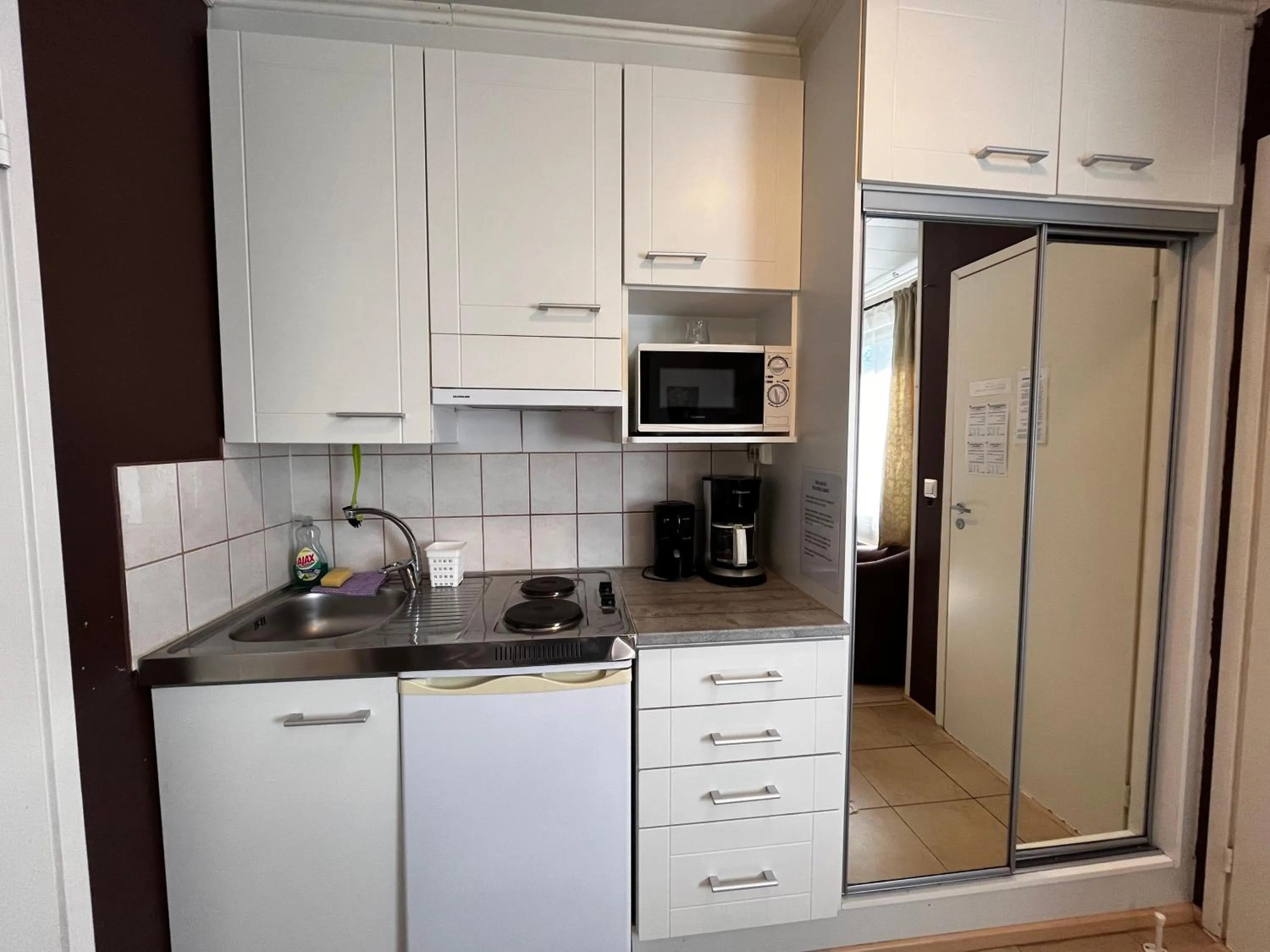 Kitchen or kitchenette in Motelli Rovaniemi