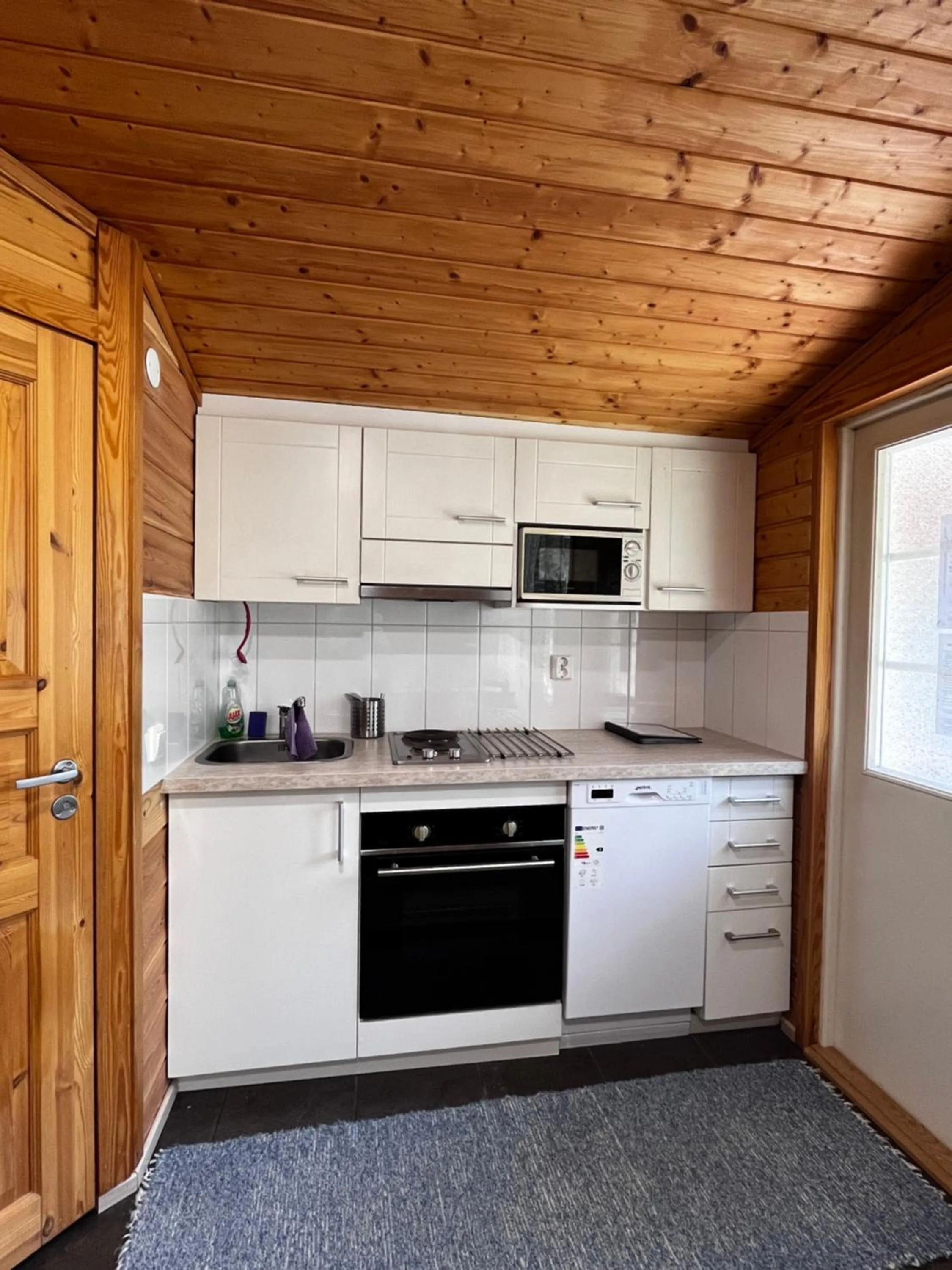 Kitchen or kitchenette in Motelli Rovaniemi