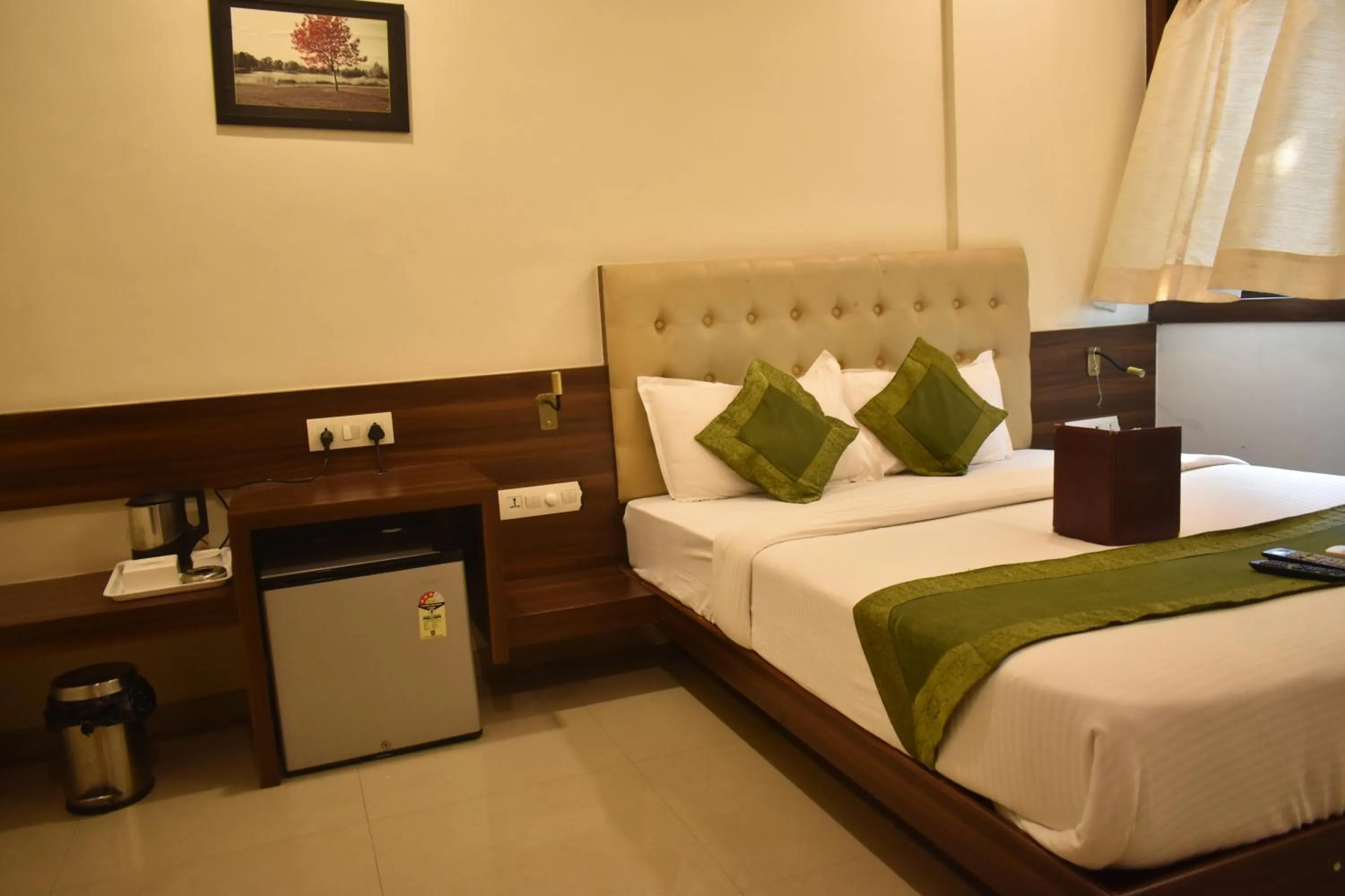 Bed in Hotel Mumbai International