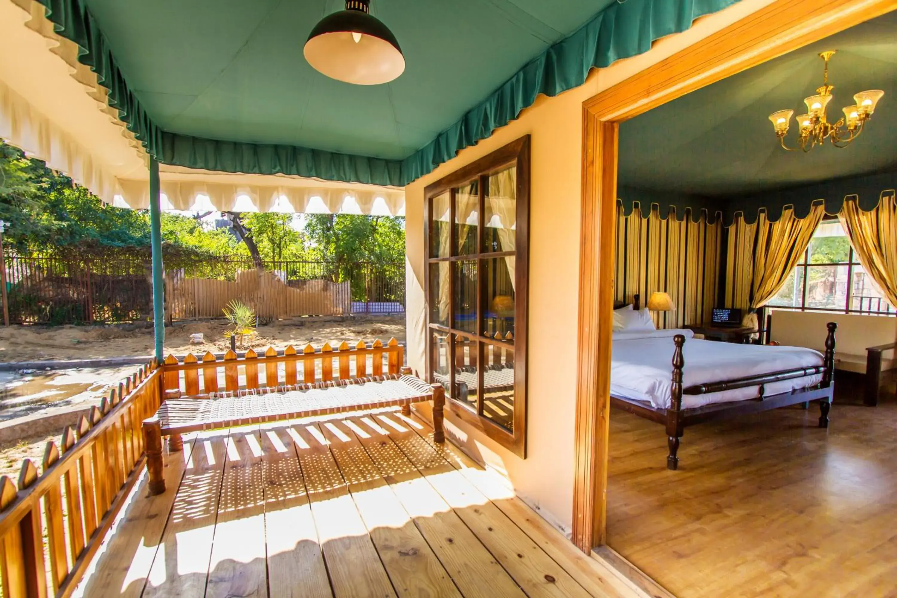 Seating area, Bed in The Baagh Ananta Elite Ranthambore Seating area, Bed in The Baagh Ananta Elite Ranthambore