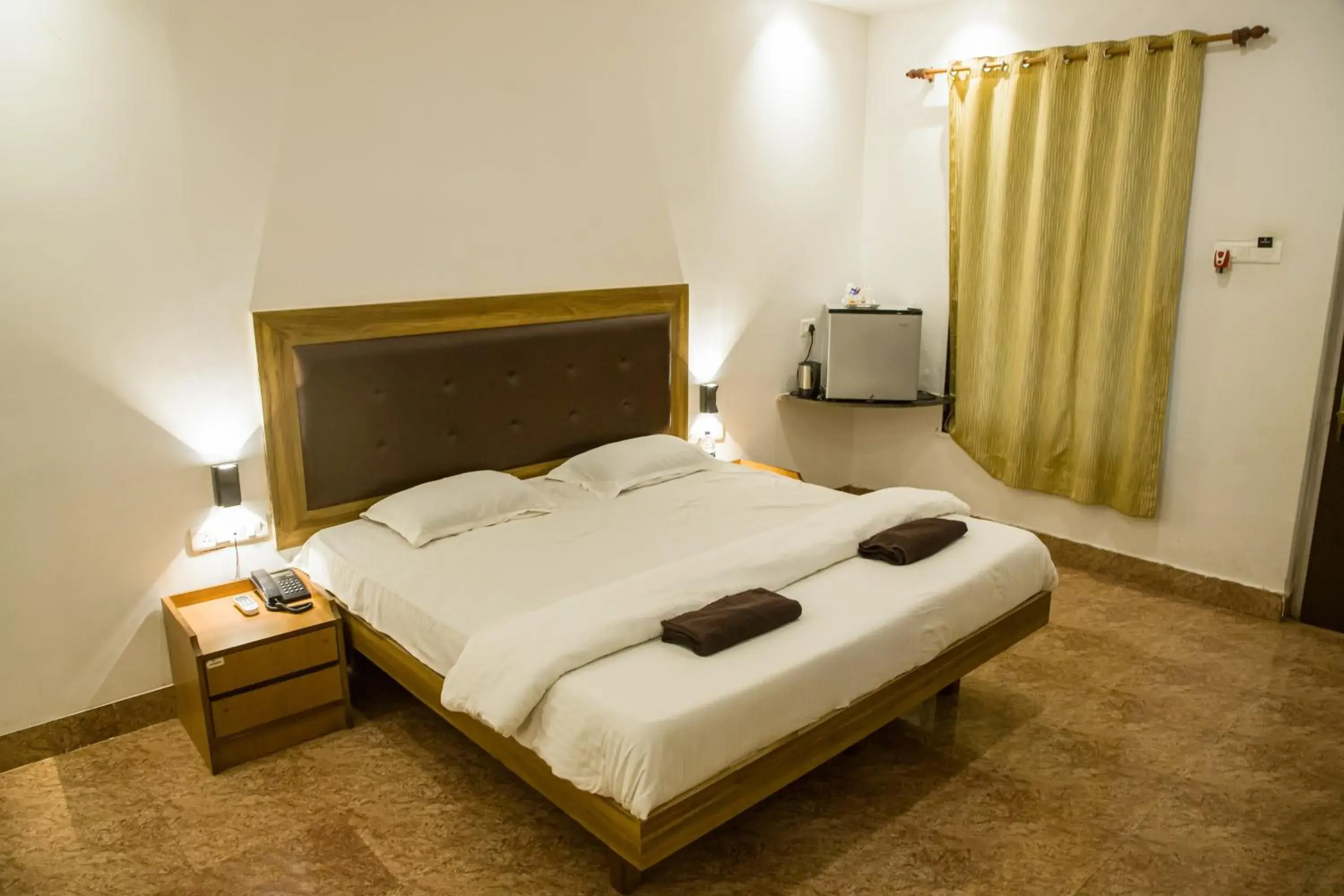Bed in Sanidhya Beach Resort & Spa Bed in Sanidhya Beach Resort & Spa