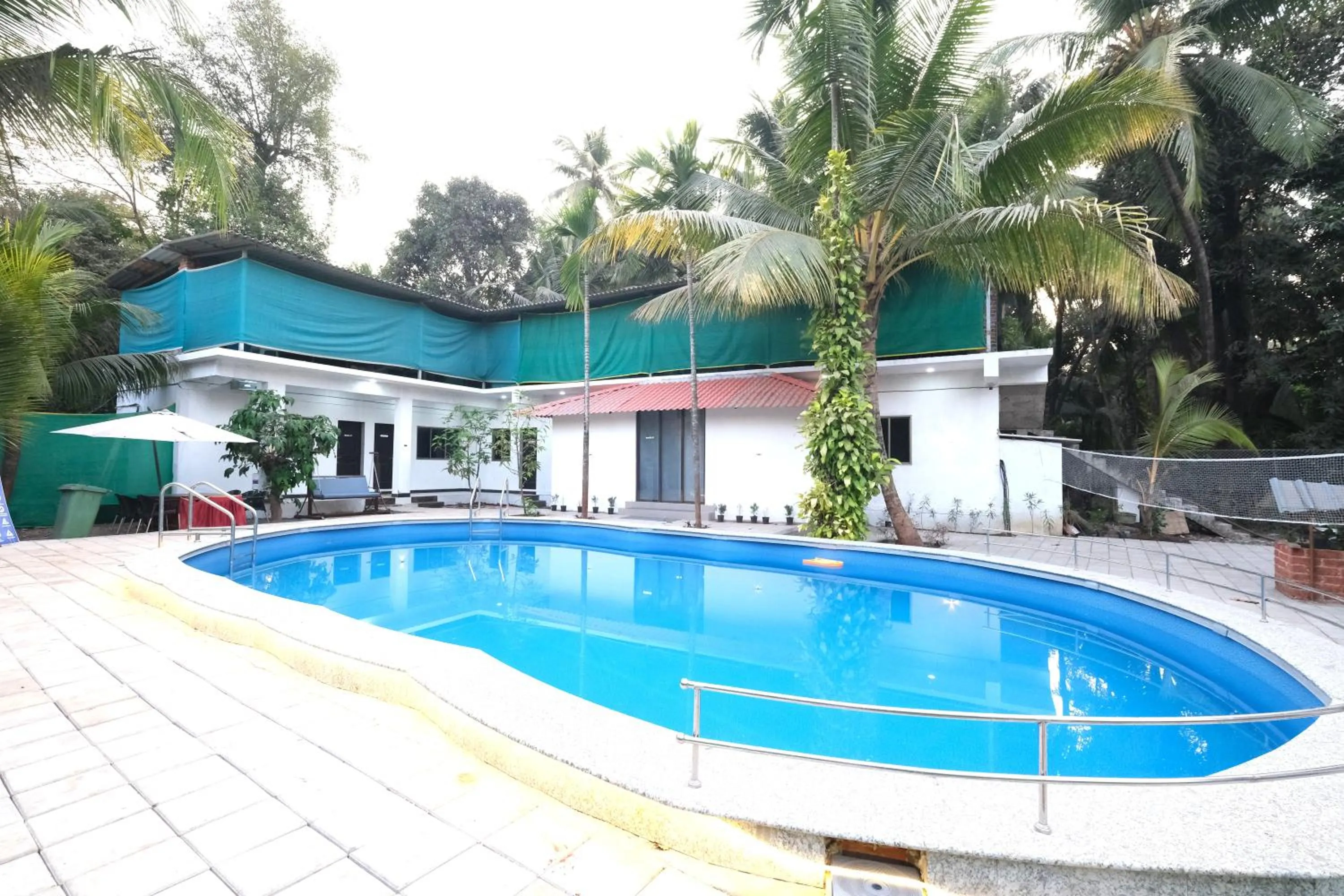 Swimming pool in Sanidhya Beach Resort & Spa