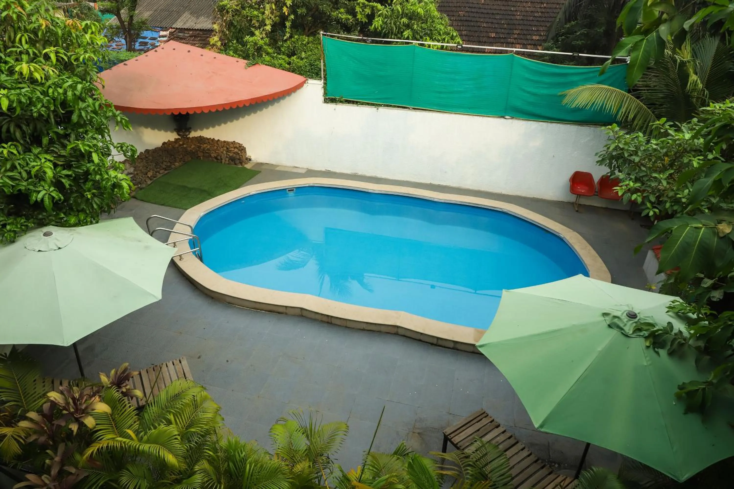 Swimming pool in Sanidhya Beach Resort & Spa