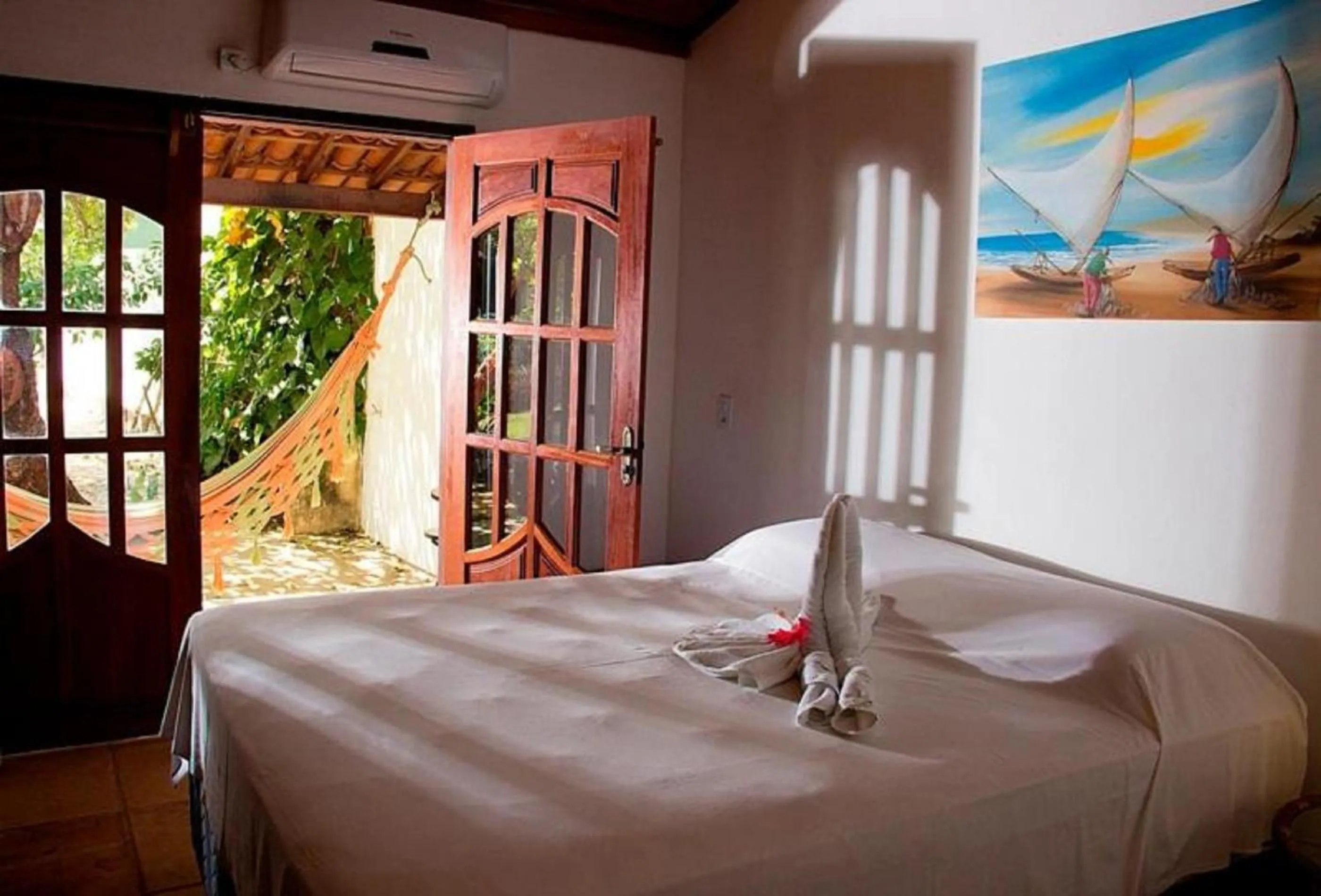 Bed in Pousada Villa Caju
