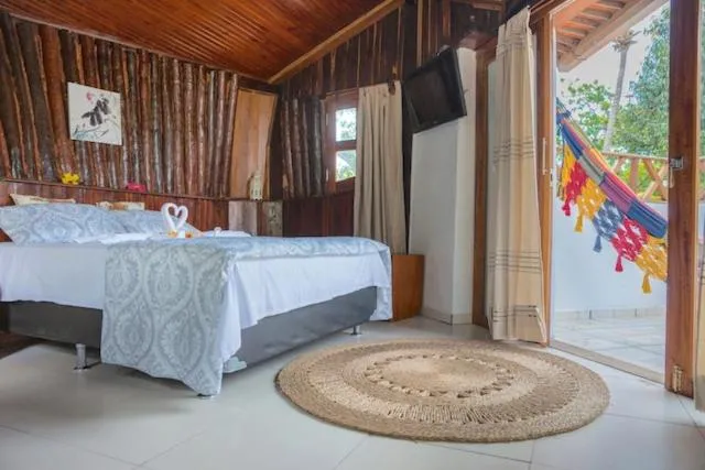 Bed in Pousada Villa Caju