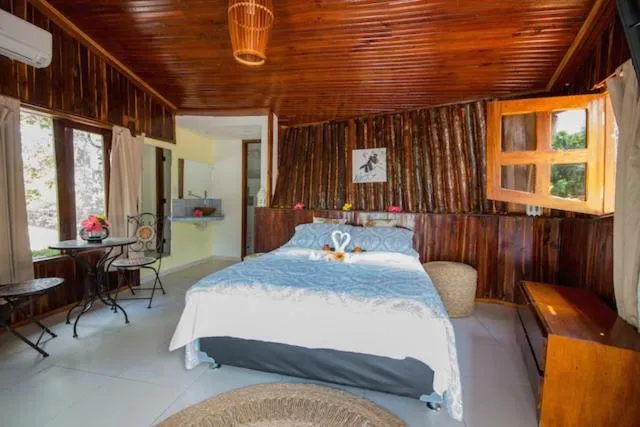 Photo of the whole room, Bed in Pousada Villa Caju