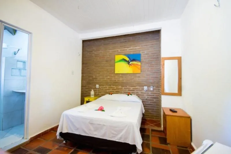 Bed in Pousada Villa Caju