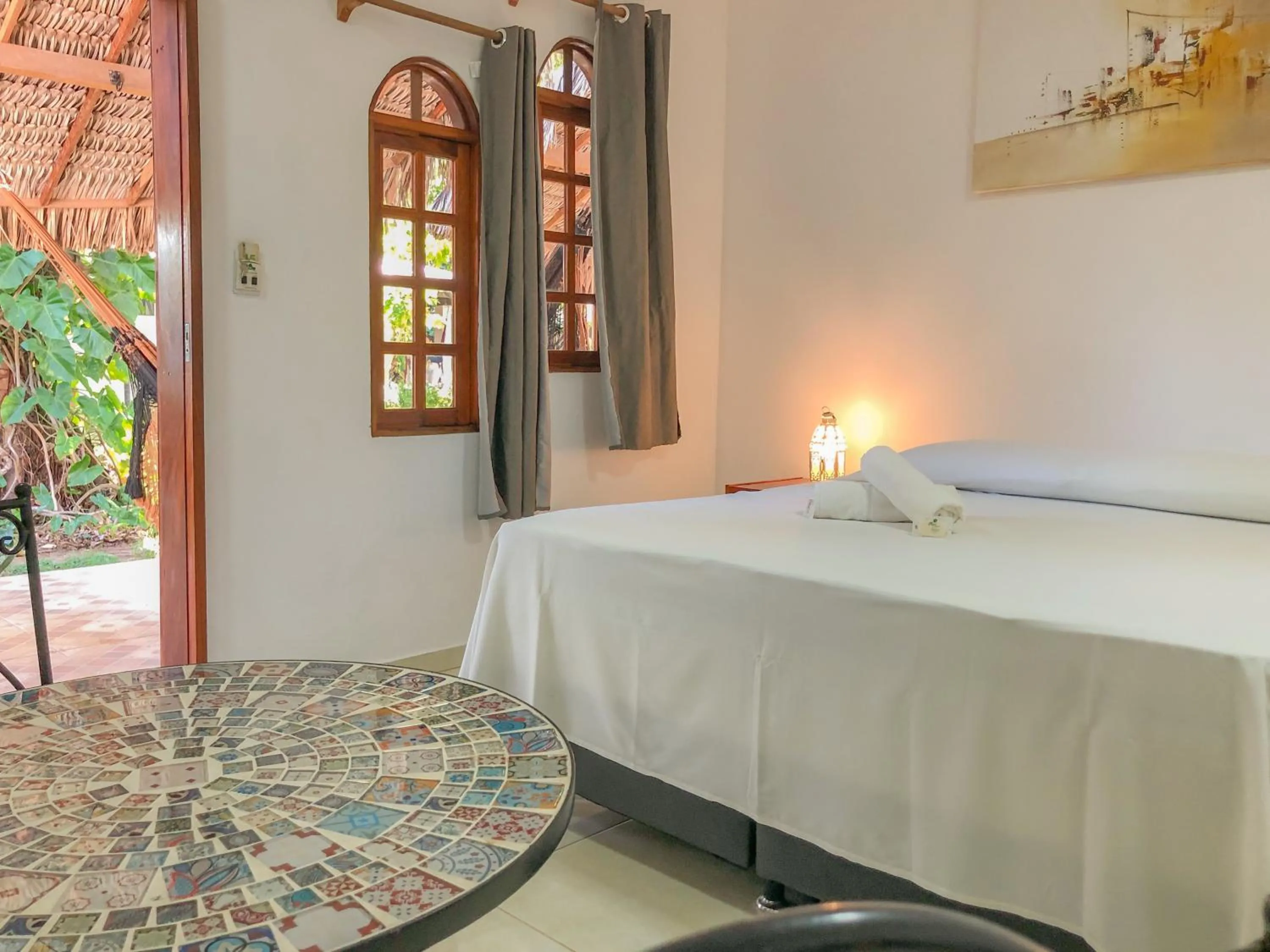 Bed in Pousada Villa Caju