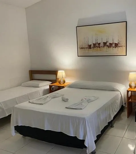 Bed in Pousada Villa Caju