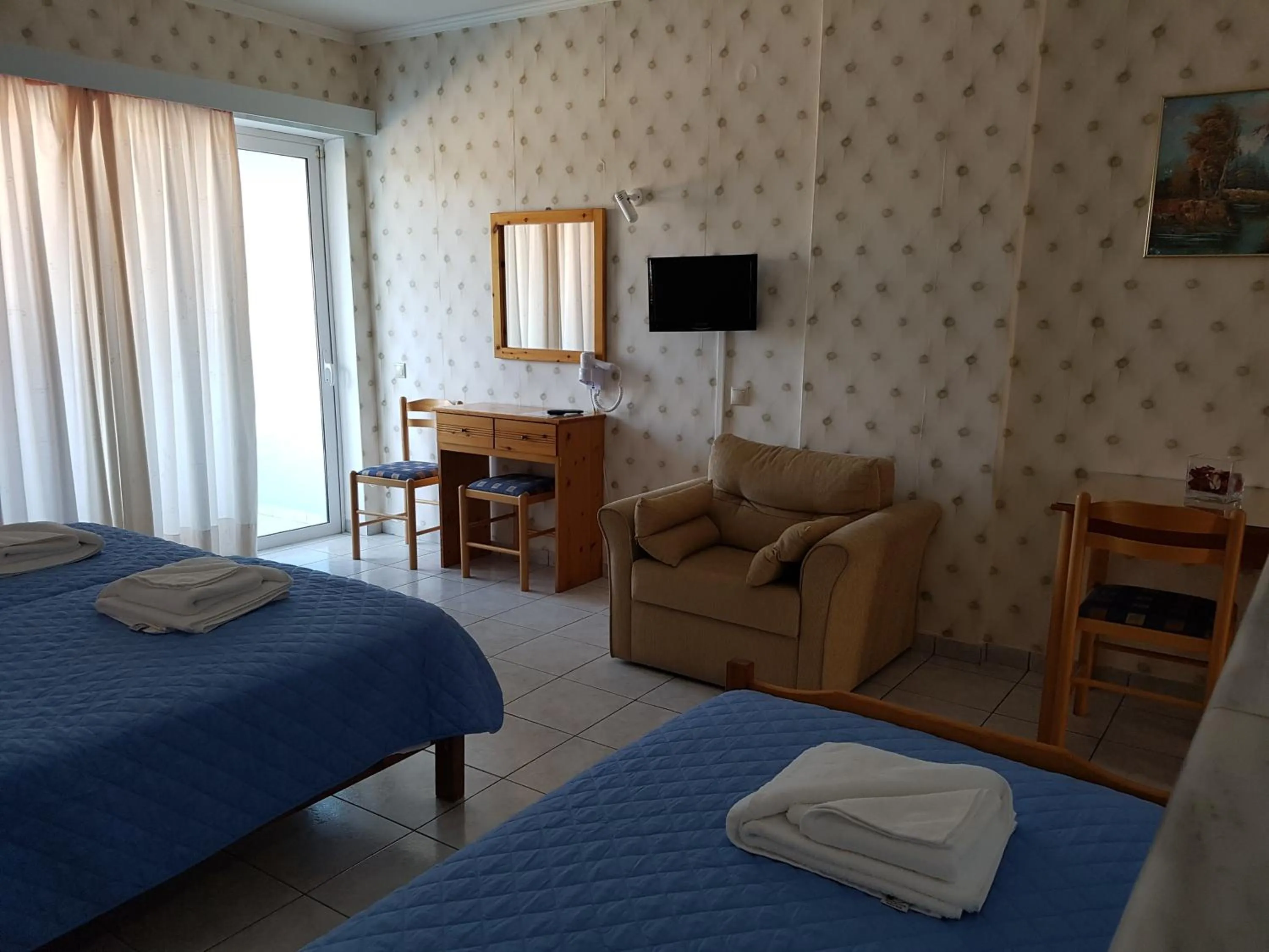 Bed in Hotel Apollon