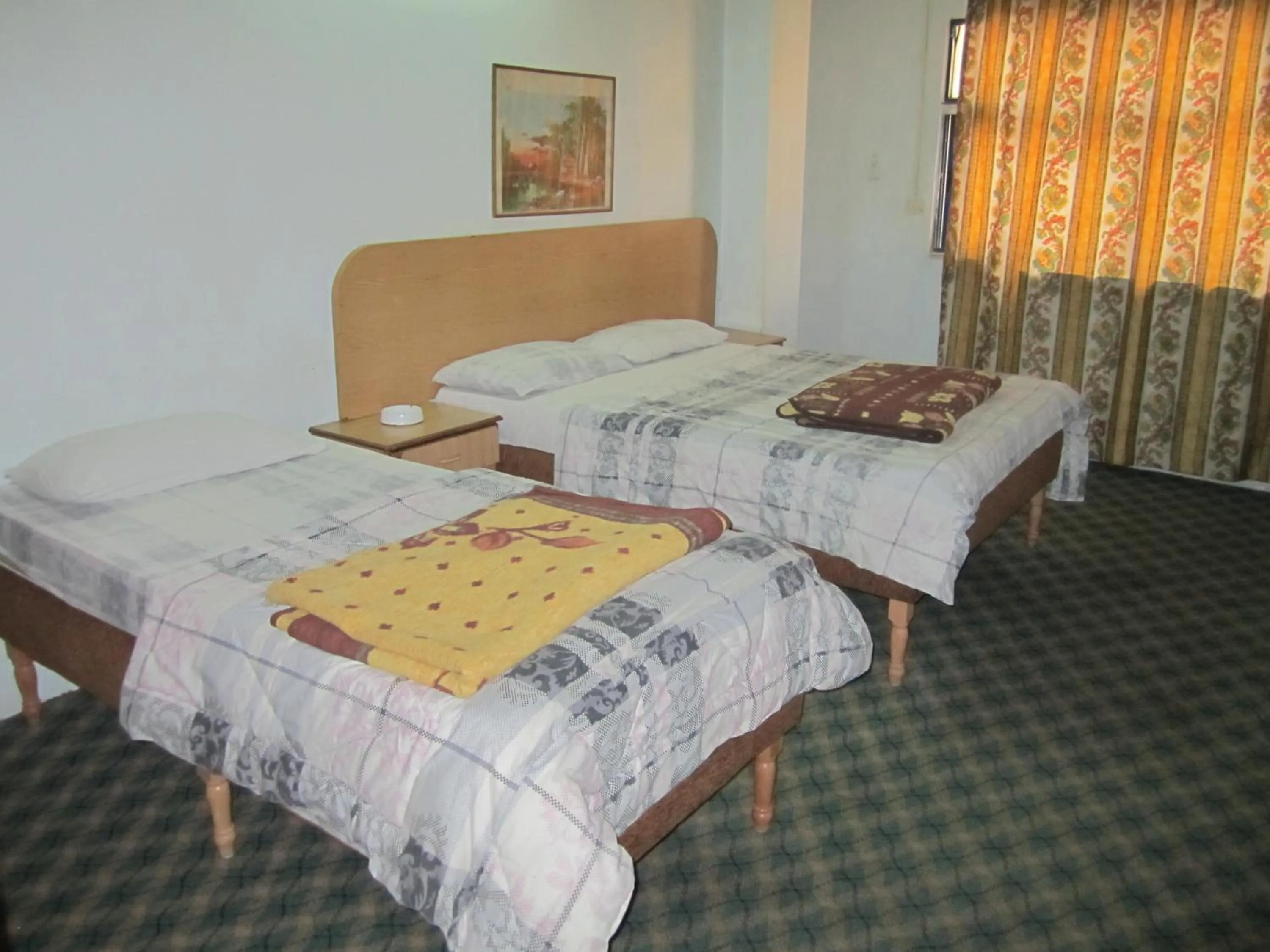 Bedroom, Bed in Asia Hotel