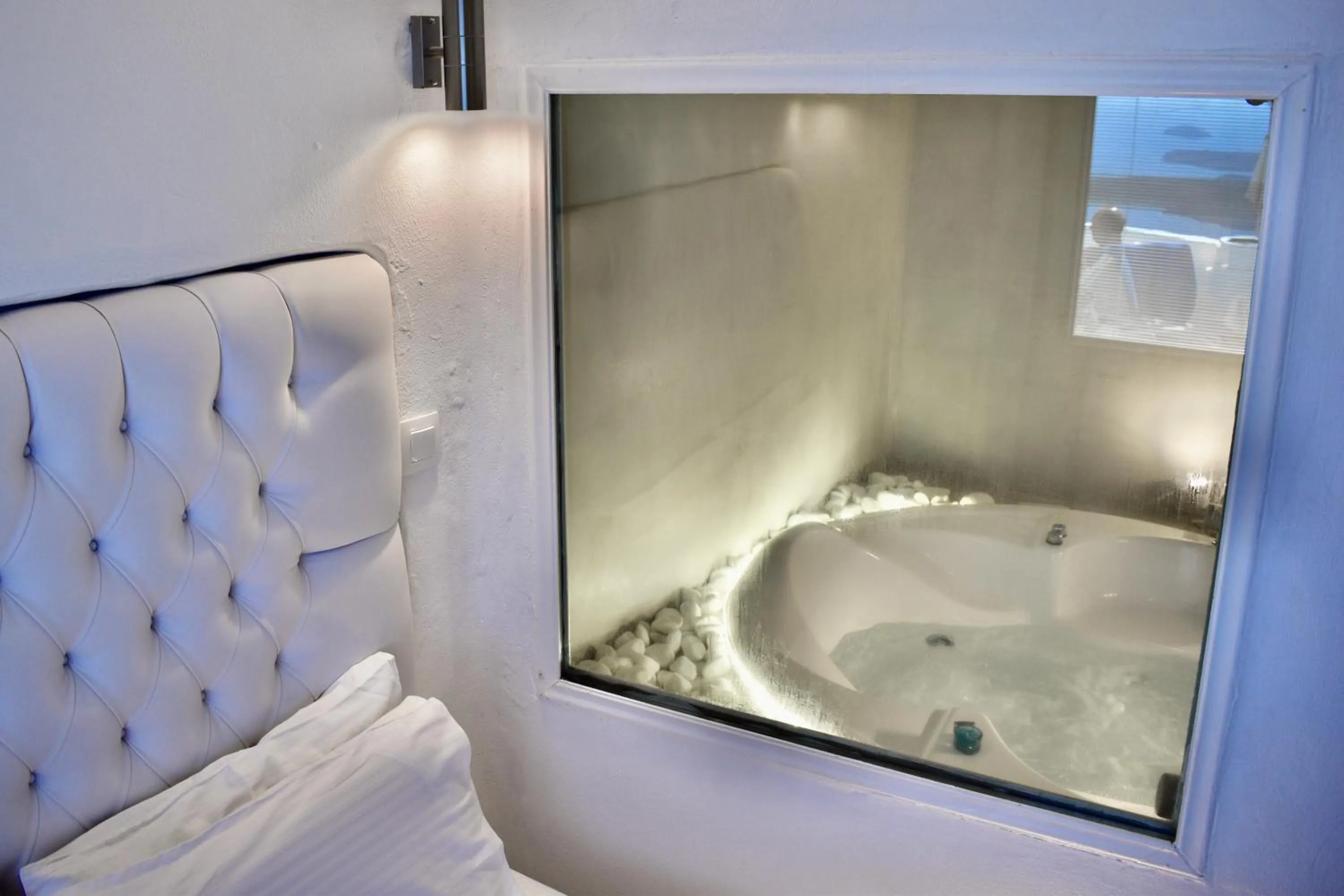 Bed in Aeolos Art & Eco Suites Adults Only