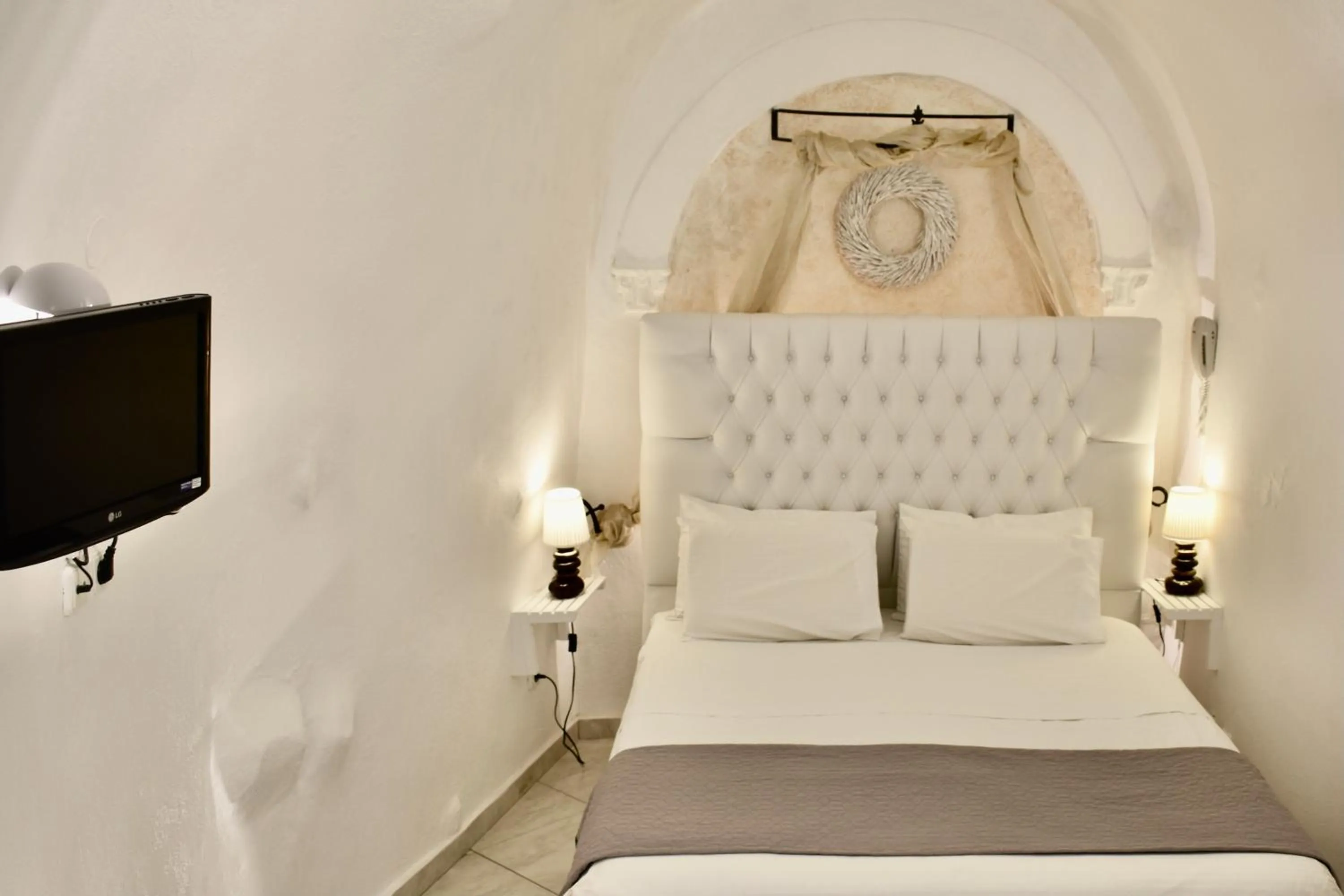 Bed in Aeolos Art & Eco Suites Adults Only