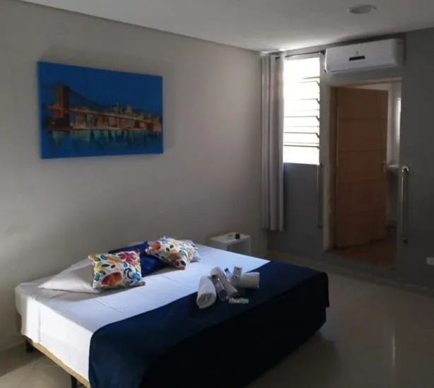 Bed in Pousada TOP Mairiporã