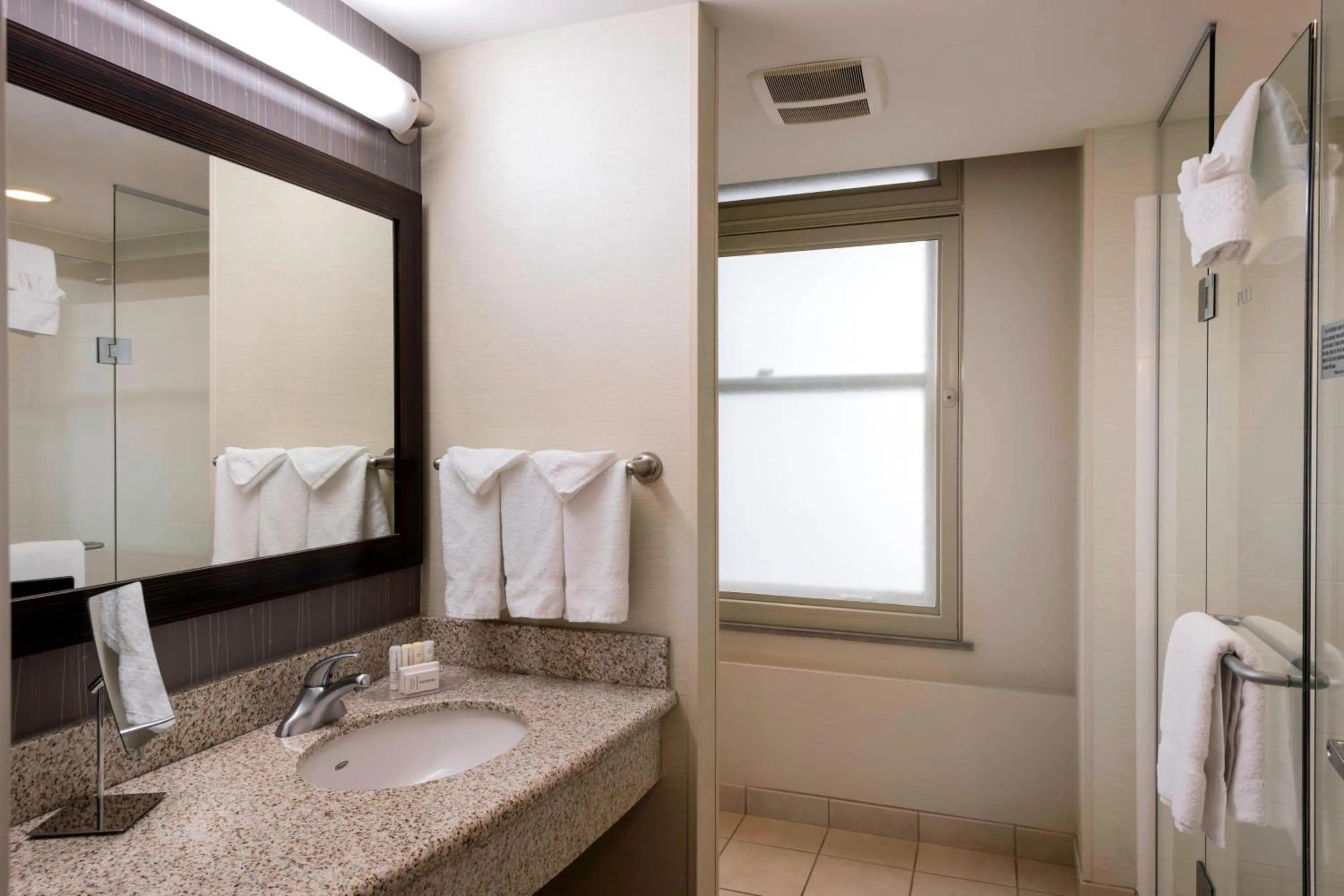 Bathroom in Courtyard by Marriott Tulsa Downtown