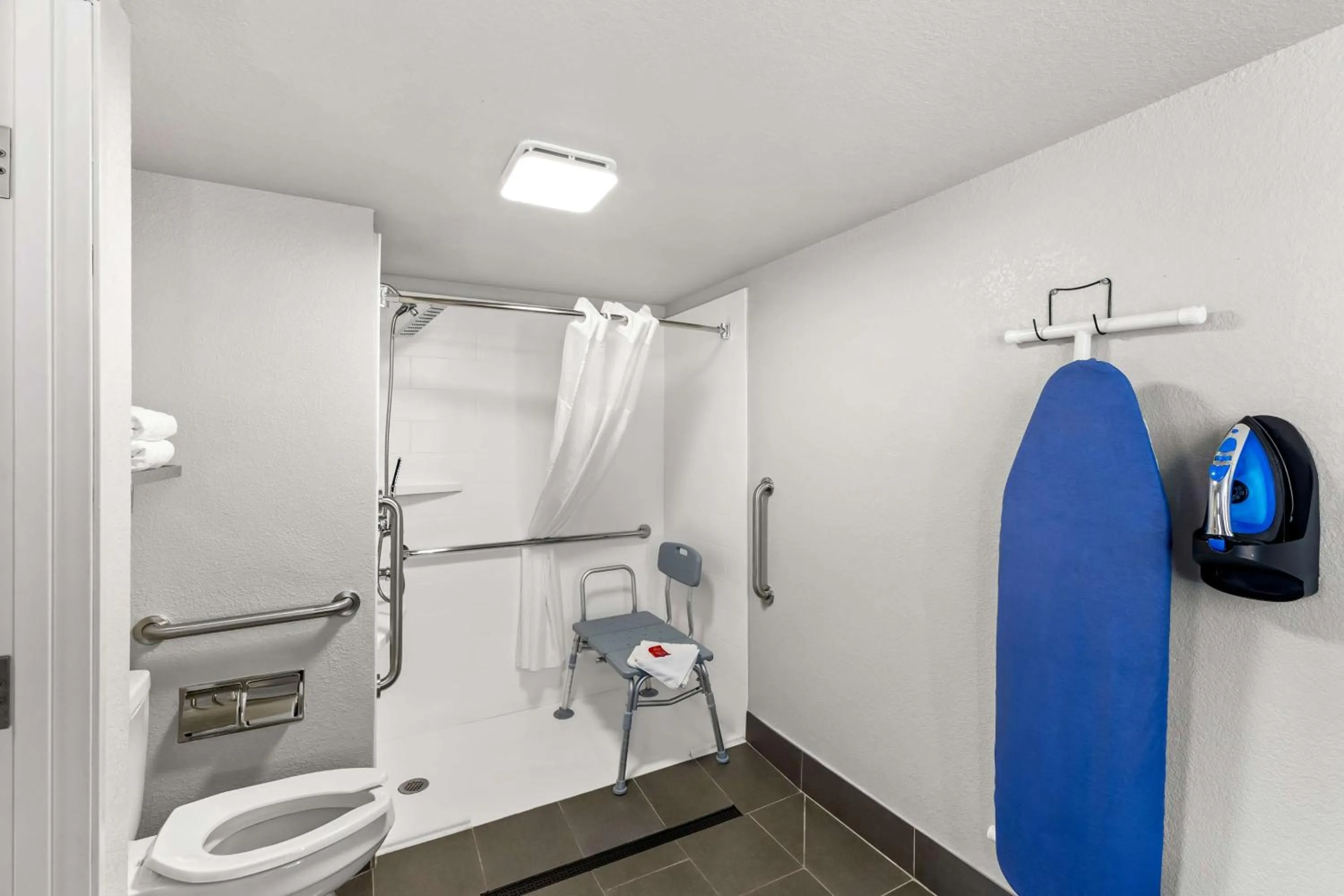 Bathroom in SureStay Hotel by Best Western Phoenix Airport