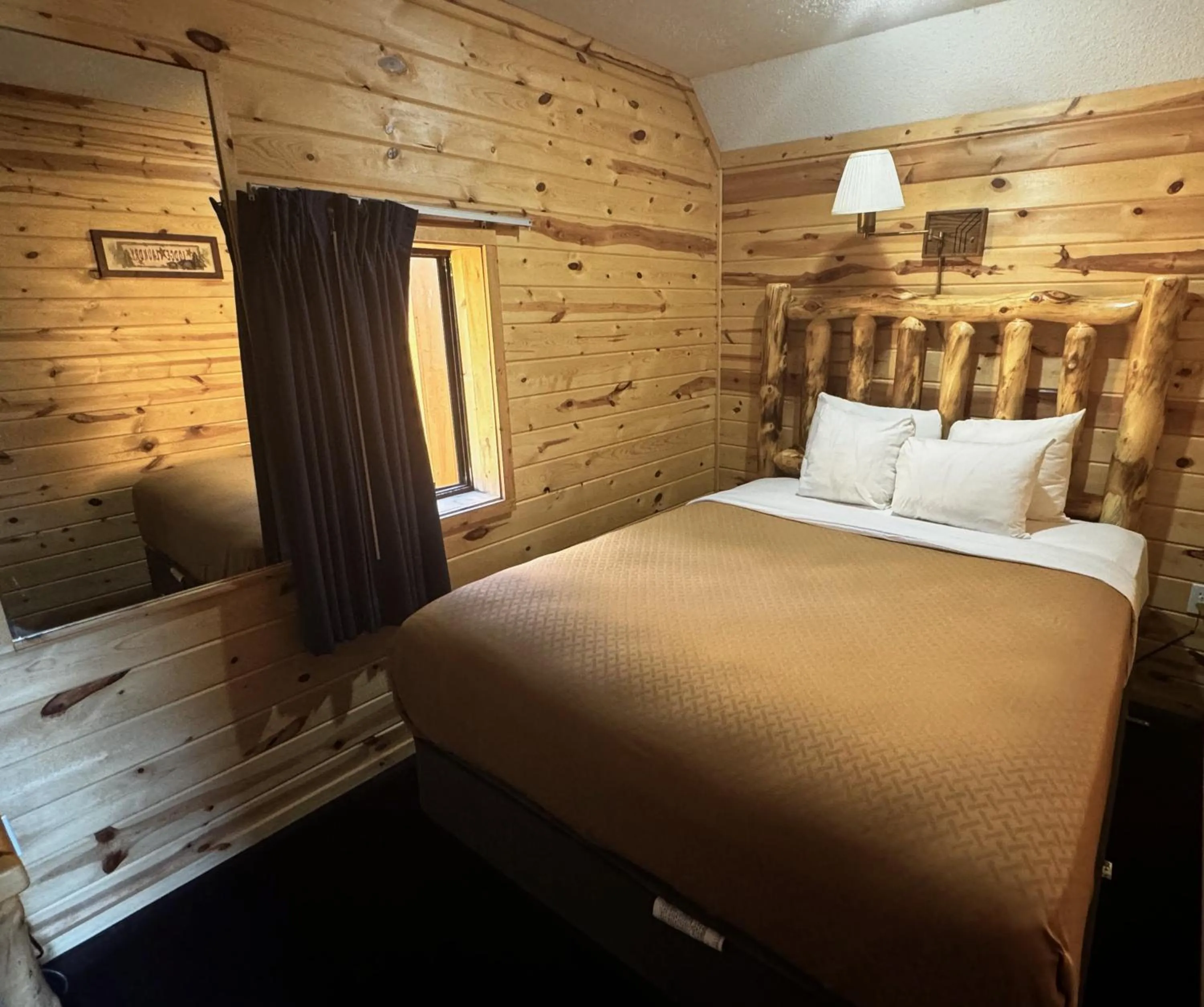 Bed in Cabins of Mackinac & Lodge