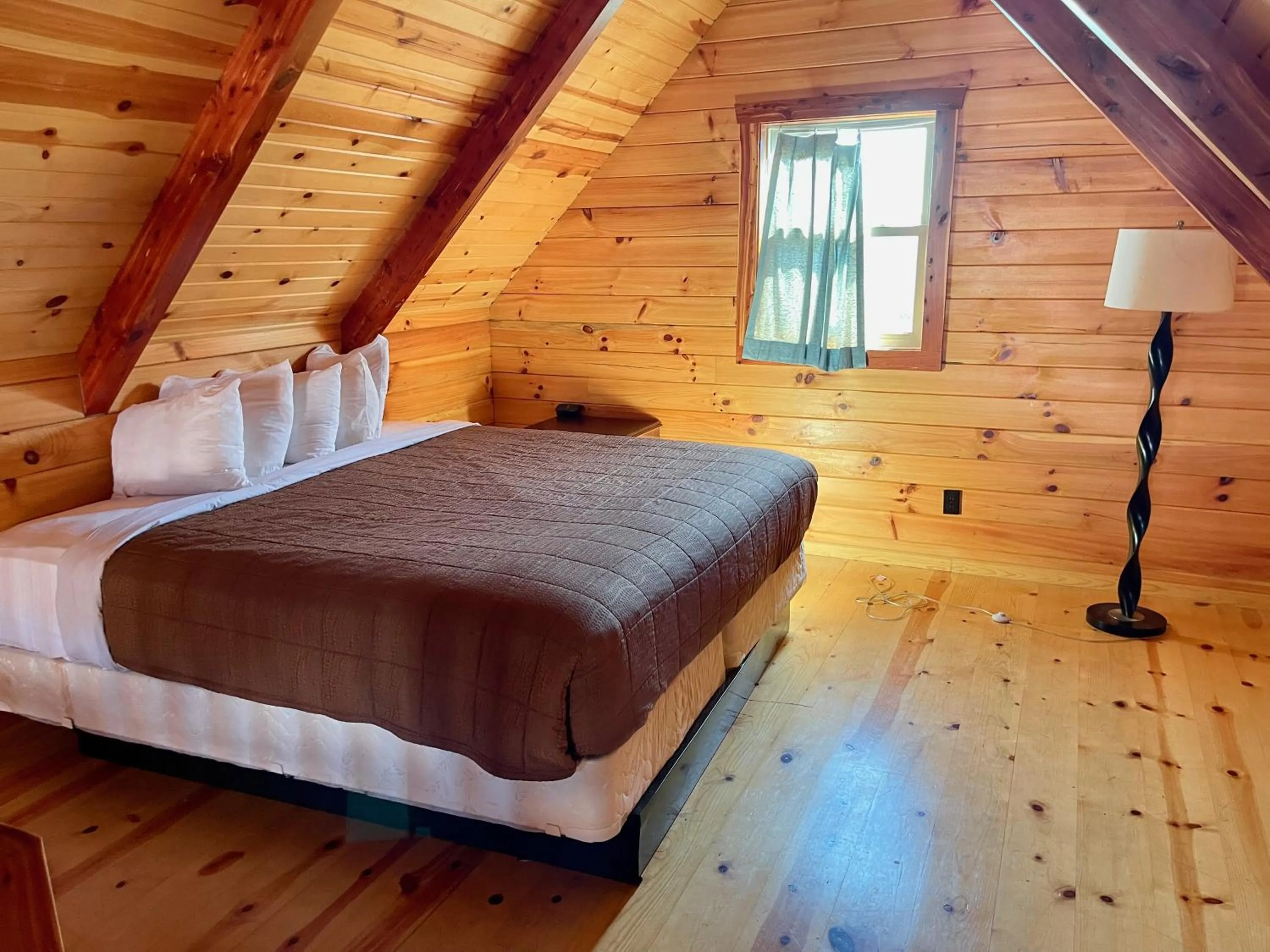 Bed in Cabins of Mackinac & Lodge