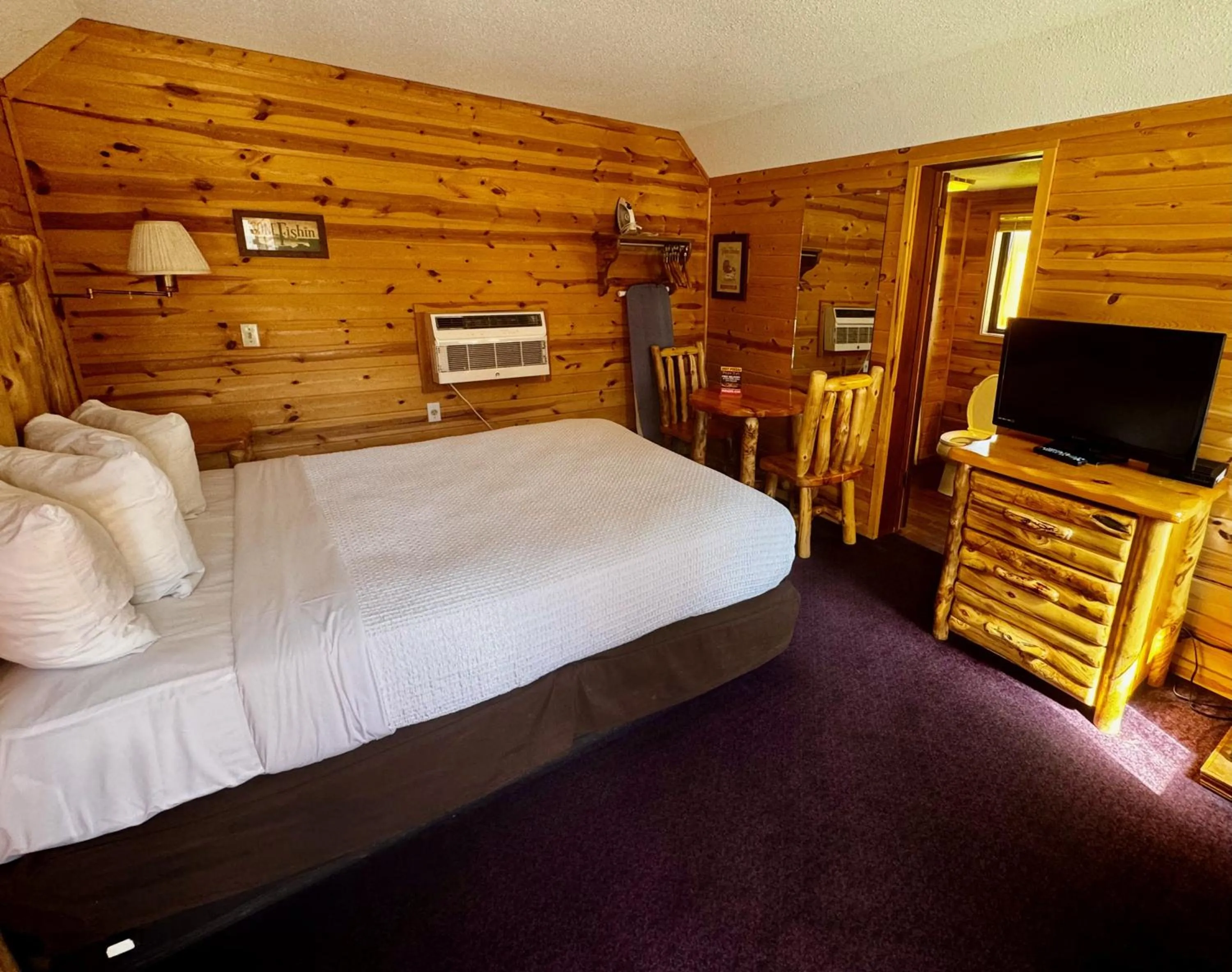 Bed in Cabins of Mackinac & Lodge