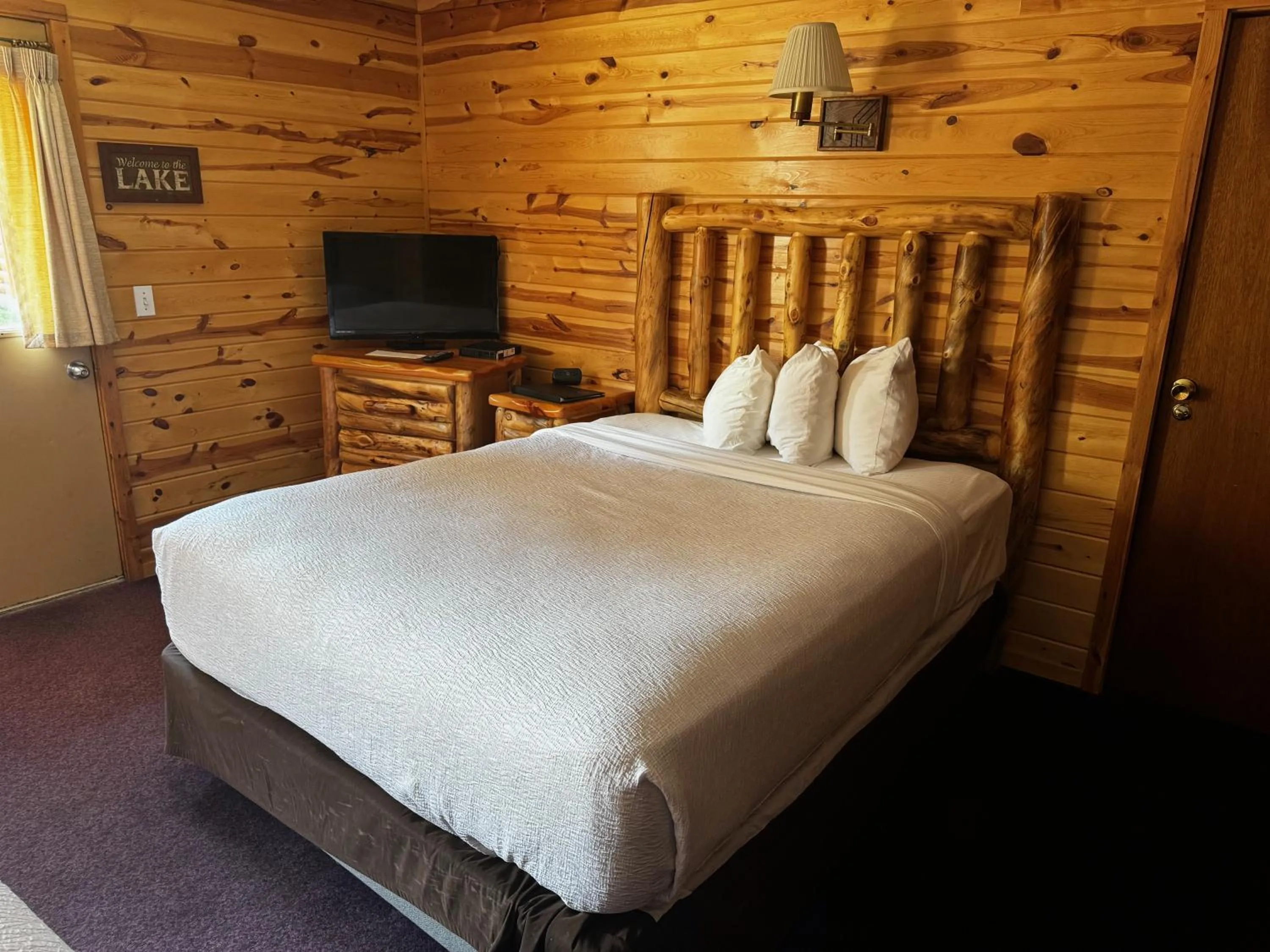 Bed in Cabins of Mackinac & Lodge