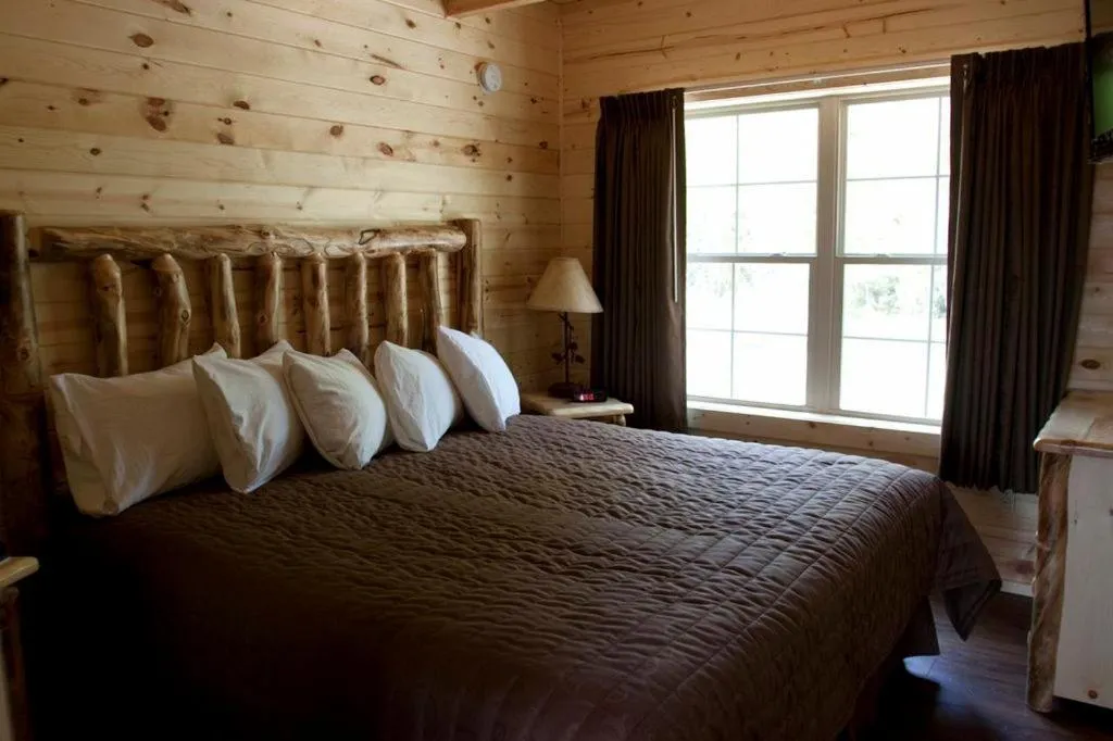 Bedroom, Bed in Cabins of Mackinac & Lodge