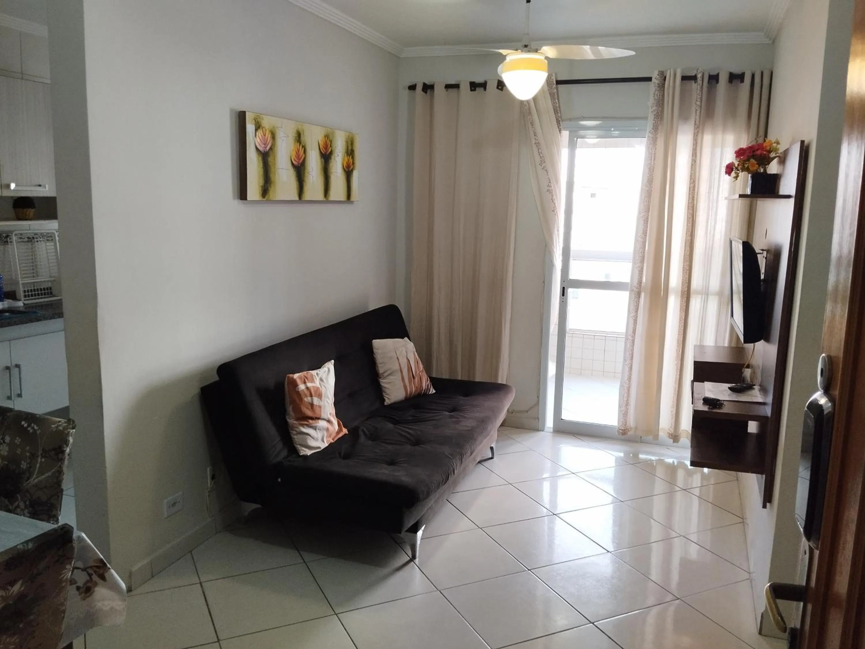 Living room in Apê Temporada Praia Grande SP Completo com Piscina, Churrasqueira, Estacionamento